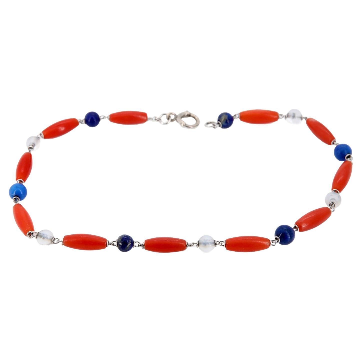 Art-Déco-Armband aus Platin mit Koralle, Lapislazuli und Bergkristall im Angebot