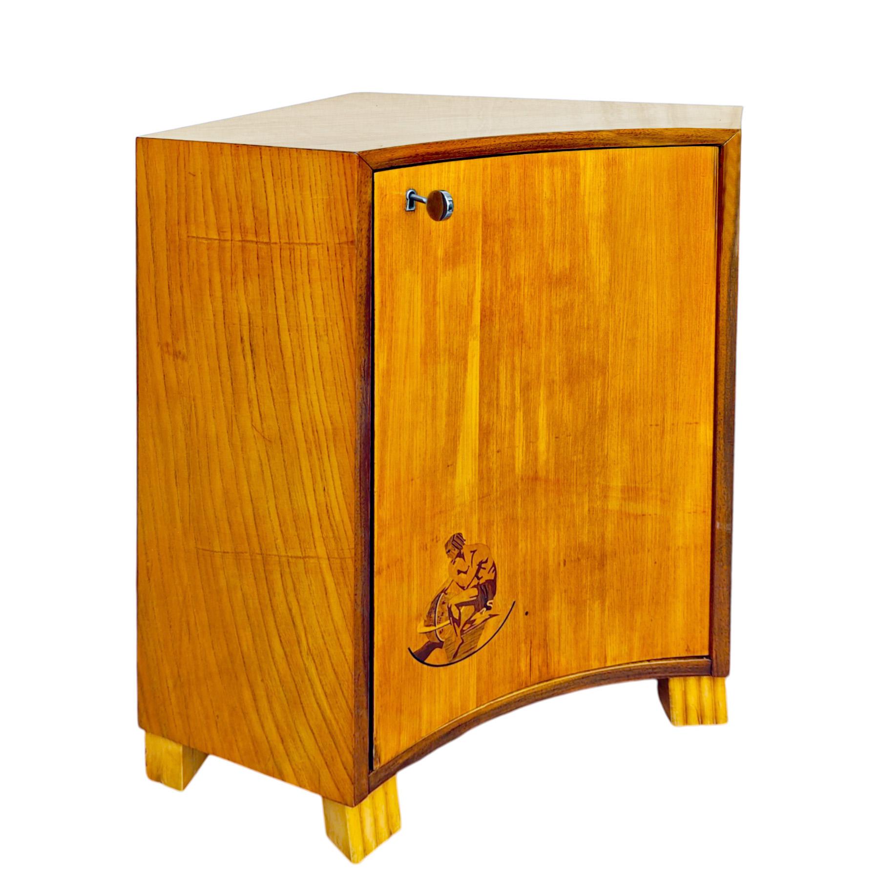 Small corner cabinet in ash veneer, walnut door frame, decorative marquetry in precious wood, French polish.

Sweden, circa 1930
