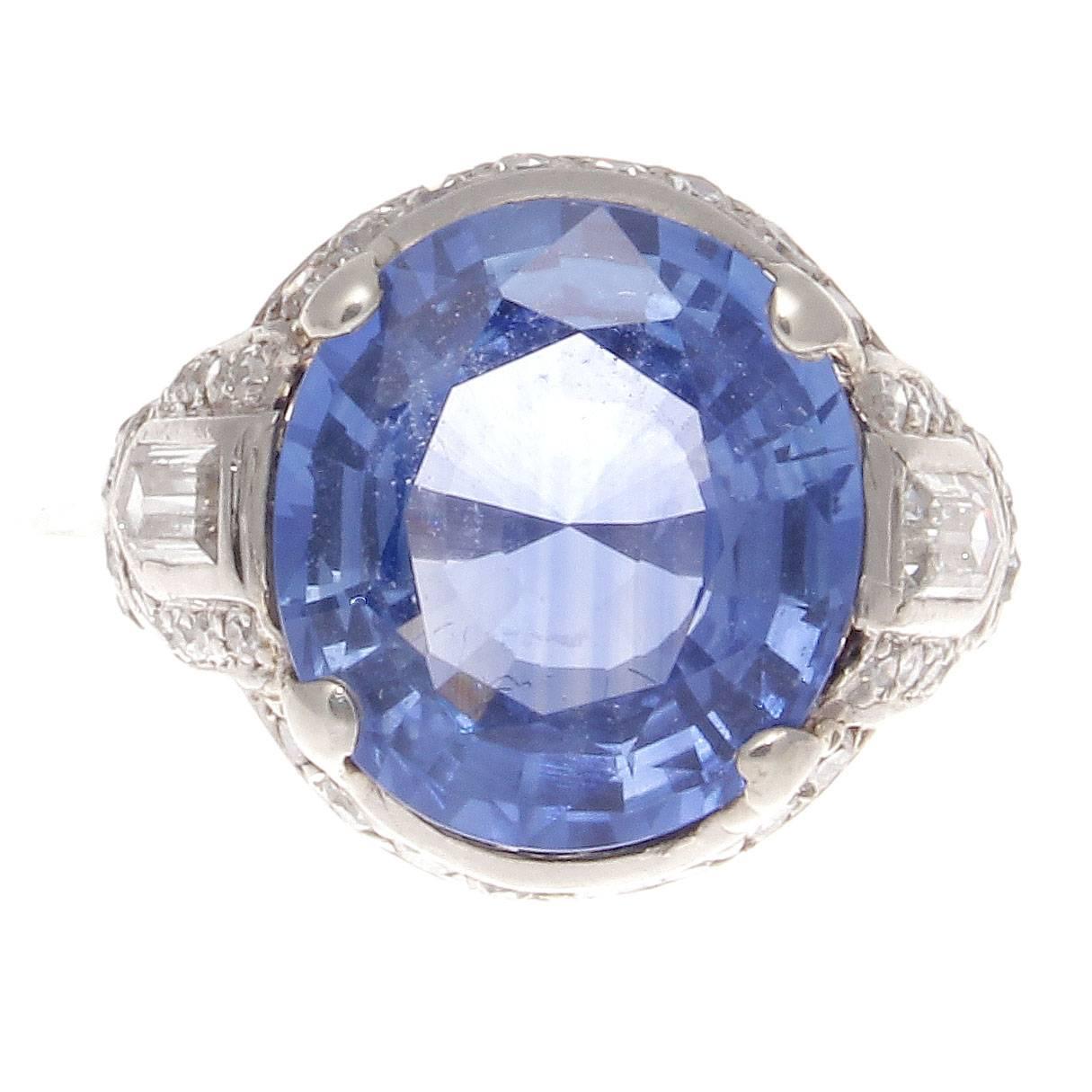 When a dream becomes reality. This architecturally finely created piece of jewelry en-captures the beauty of the 1930's, the Art Deco time period. Featuring a 7.56 carat sapphire that radiates the cornflower blue that the Sri Lanka region is famous