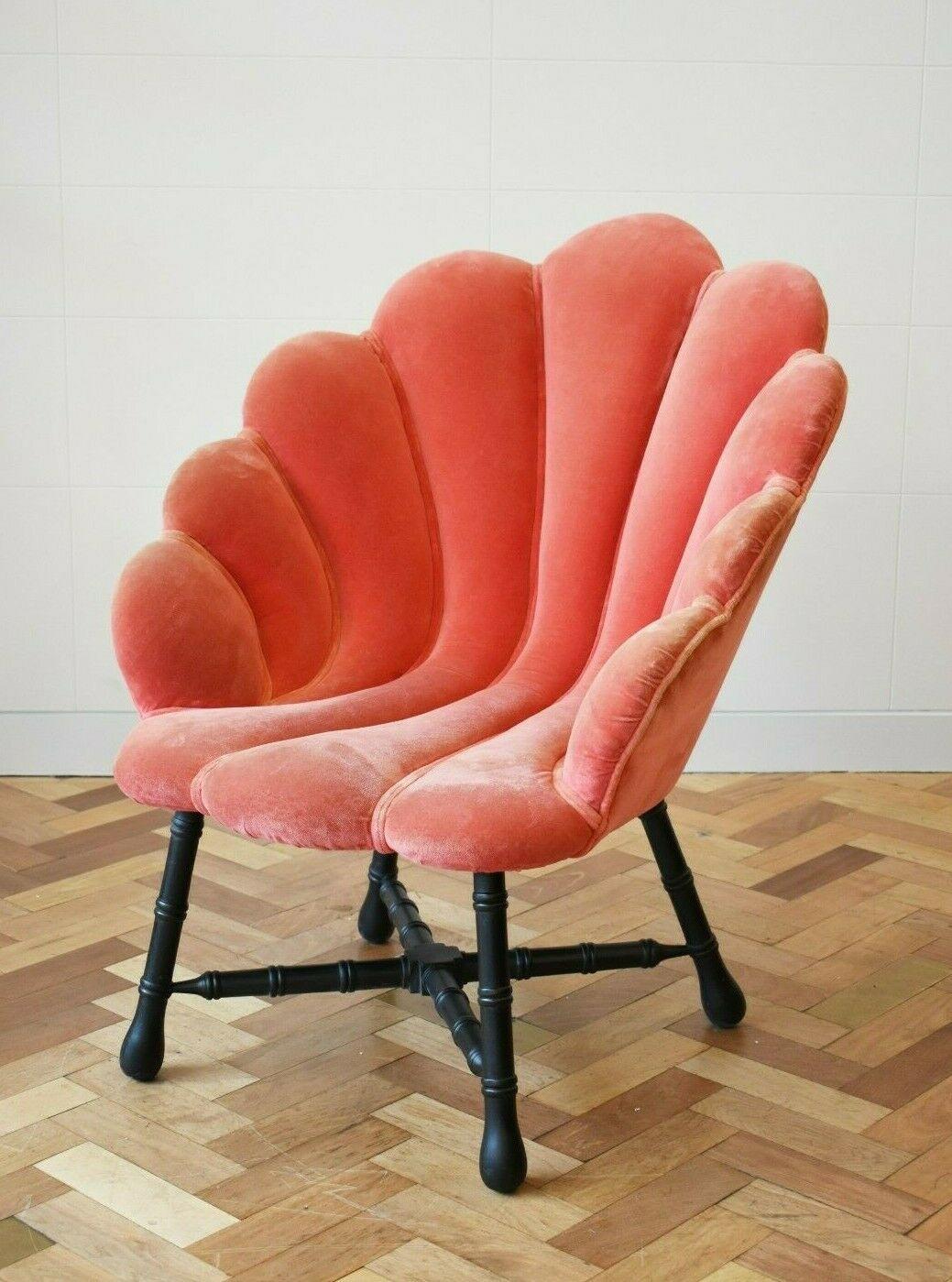A beautiful and rare original 1930's art deco armchair in the shape of a shell. 

This stunning piece is in its original cotton velvet upholstery which shows signs of age which add to the charm of this rare and beautiful chair. The fabric has no