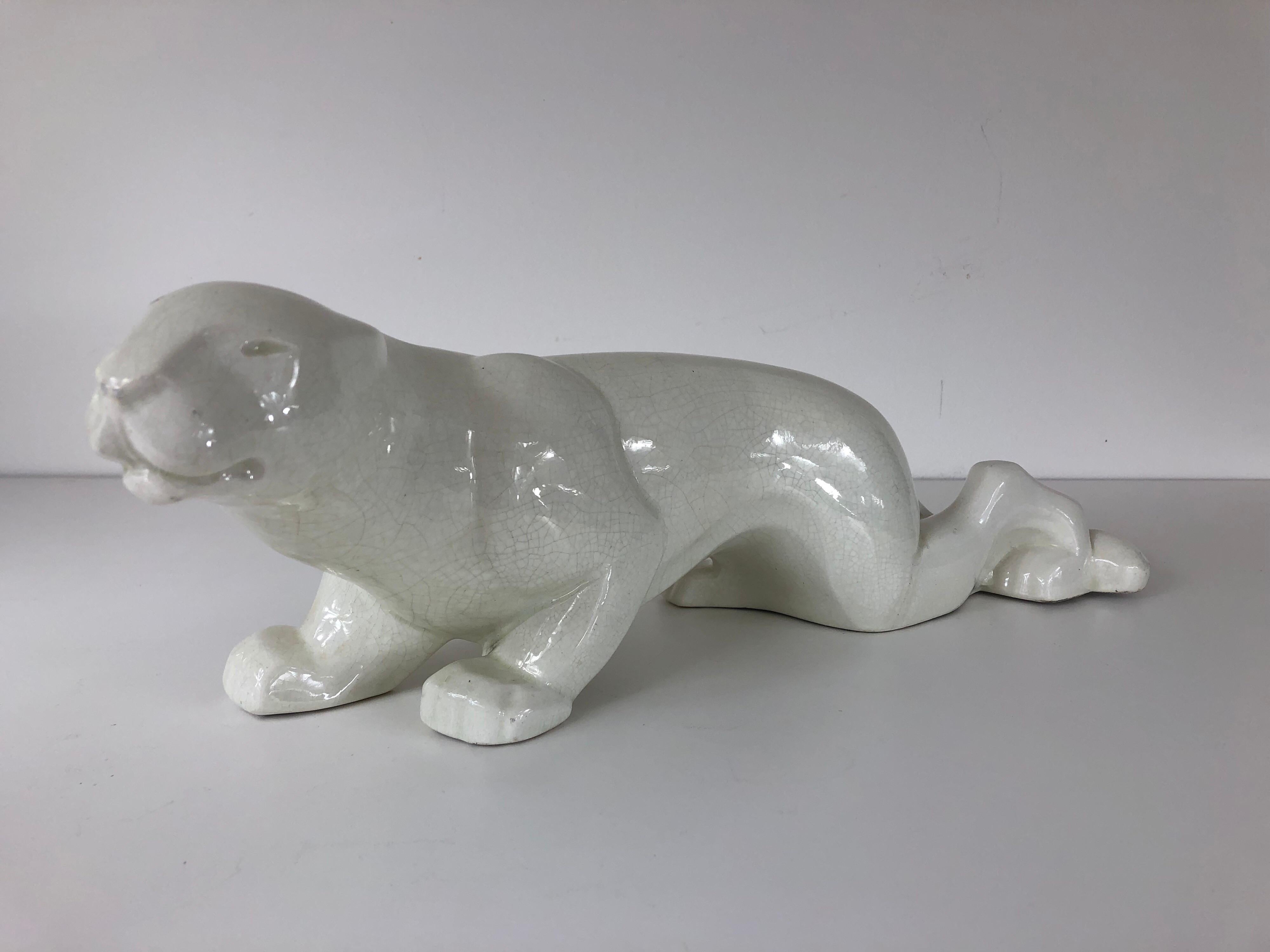 Art Deco crème crackle glaze ceramic panther in the crouching position by Saint Clement.