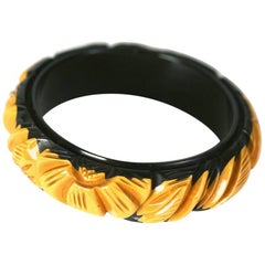 Art Deco Cream to Black Carved Bakelite Bangle
