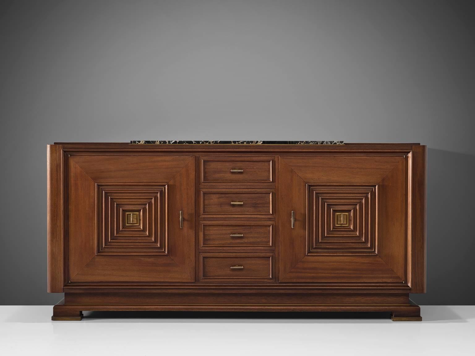 Credenza, in mahogany, walnut, marble and brass, France, 1930s. 

Large Art Deco sideboard in the style of Maxime Old. This heavy, almost Brutalist, credenza seems to float on its elegant base with stunning bronze detailing. The credenza is