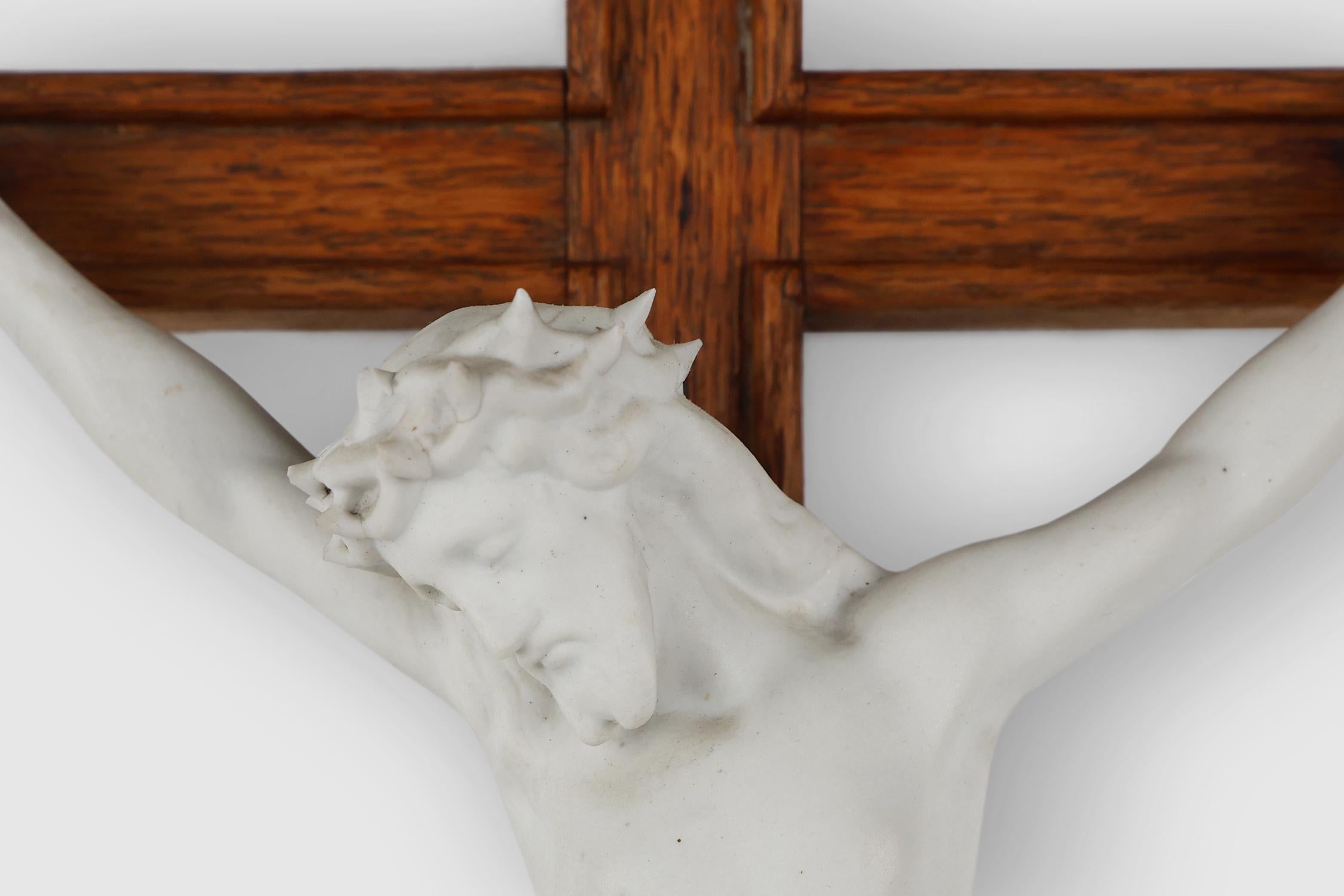 Hand-Carved Art Deco Crucifix in oak and porcelain, Belgium ca. 1930