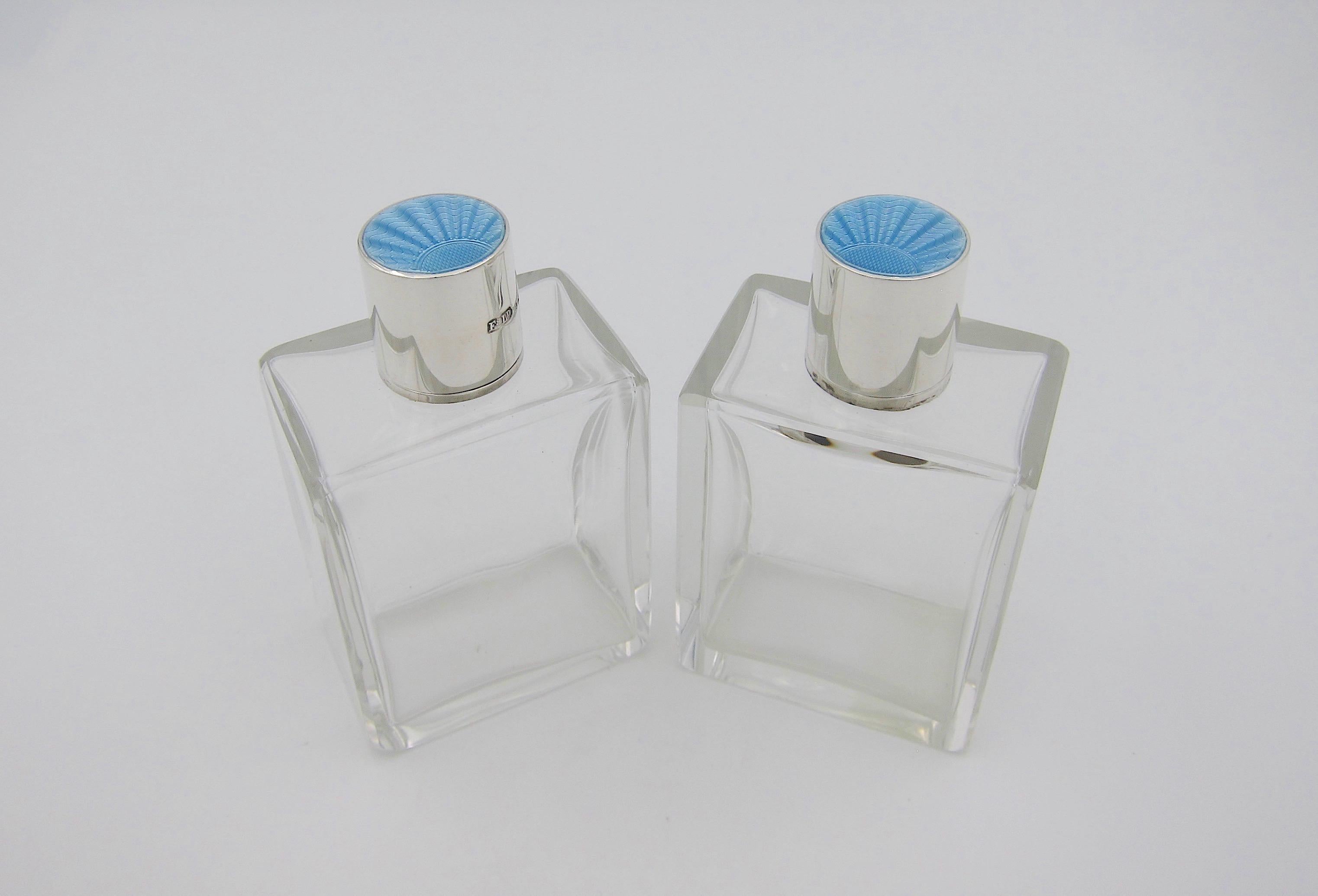 perfume in blue bottle with silver top