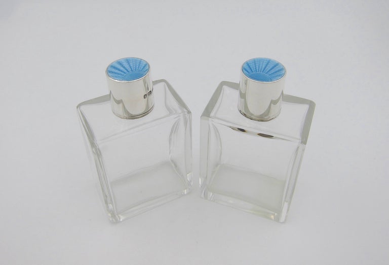Enameled 1936 English Art Deco Perfume Bottles with Sterling Silver and Blue Enamel Tops For Sale