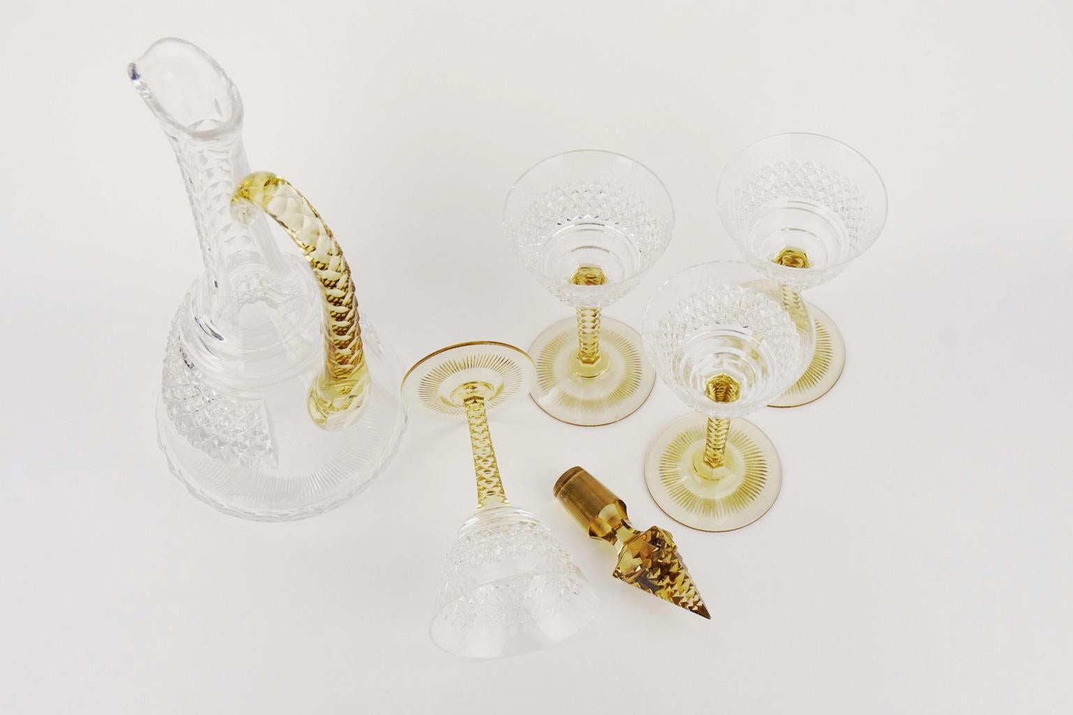 A crystal decanter in white and topaz set with four glasses in very good condition. Original stopper. Very good condition.
Size:
Decanter, height 34 cm, diameter 13 cm.
Four glasses, height 13.5 cm, diameter 8 cm.