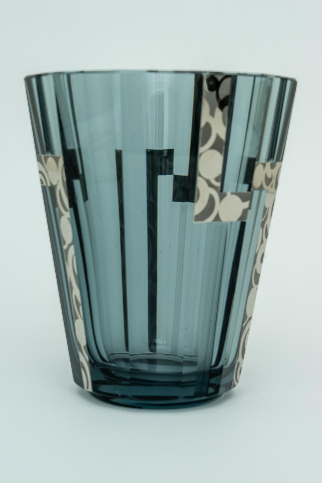This stylish Art Deco vase is very much in the manner of pieces created by Joseph Hoffman and it was acquired from a Palm Beach estate, and it dates to the 1920s-1930s.