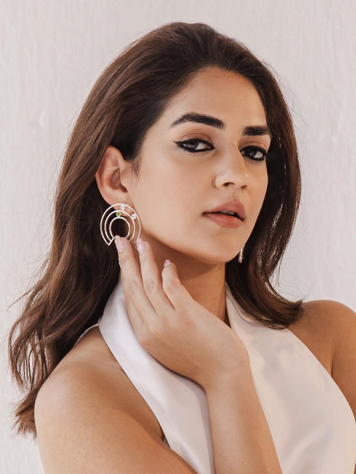 Art Deco Cubic Zirconia Circle Stud Earrings in sterling silver. You shall need these stud earrings to make a statement with your look. Each piece features dazzling cubic zirconia stones, renowned for their brilliance and clarity, set in