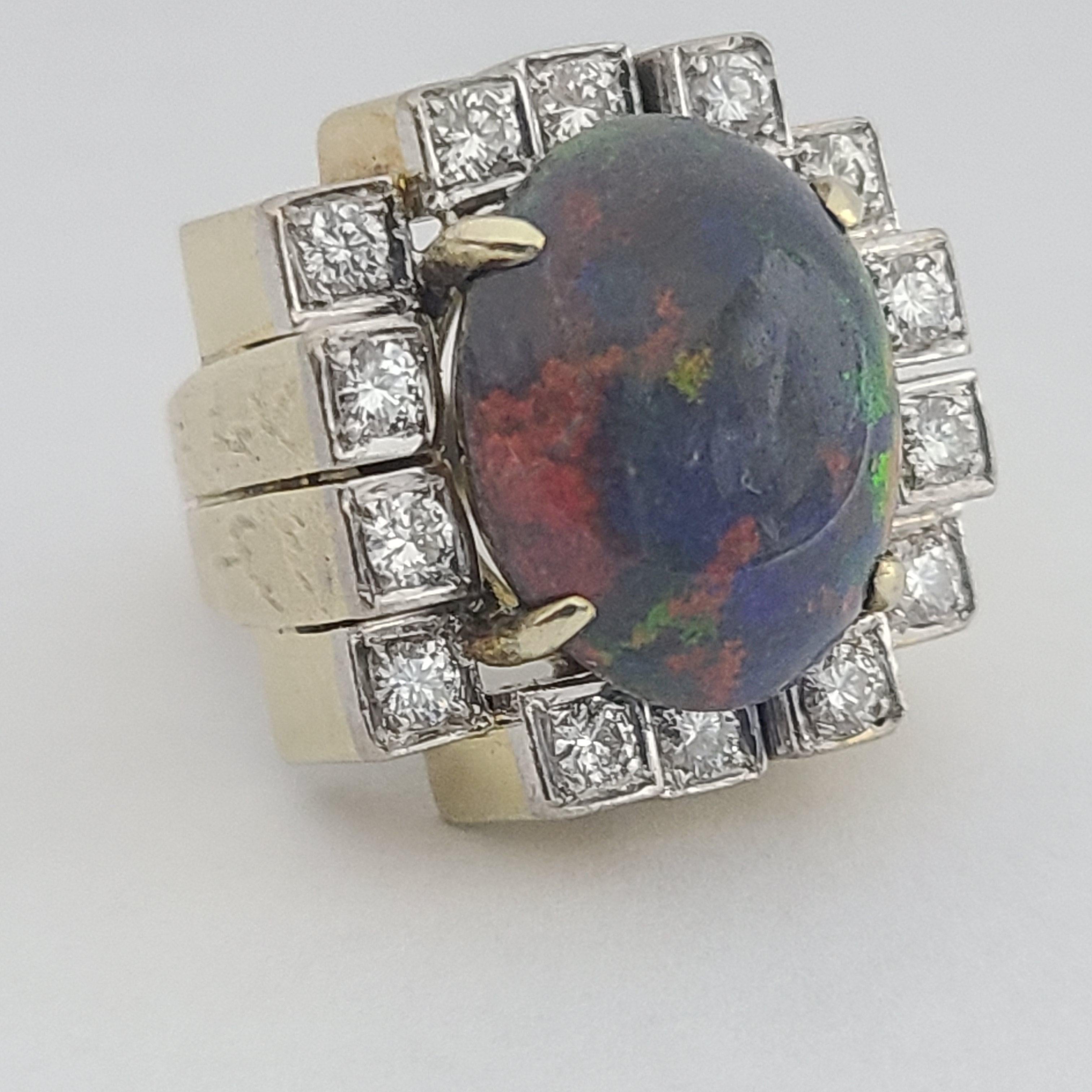 Amazing platinum topped modernist cubist chunky and hefty 17.3g 14k gold ring.  Set w/ a 16 x 12mm natural black opal cabachon with amazing play of color, bright electric oranges, purples, blues, and vivid reds.  14 approx 2.5-2.75mm full cut round