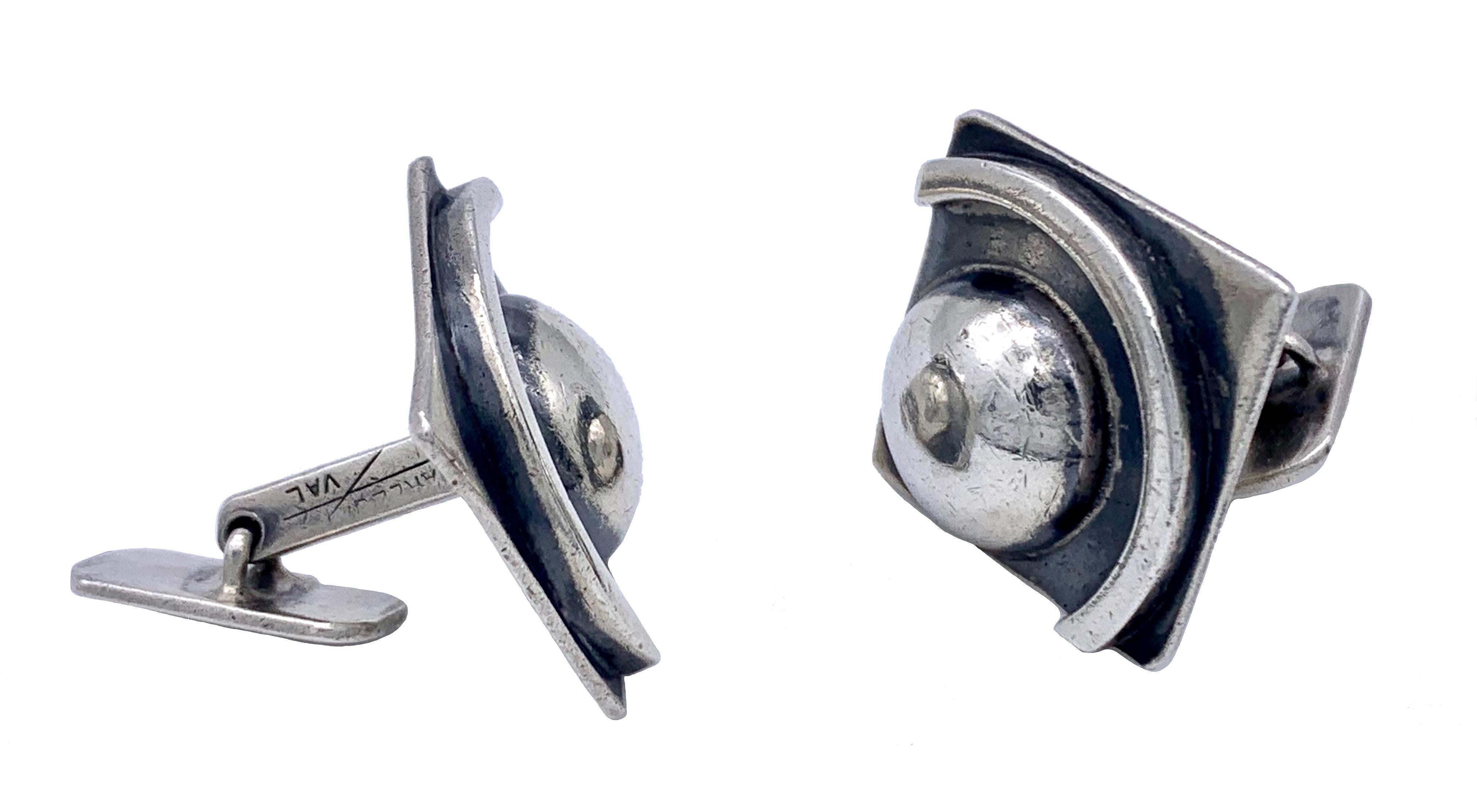 These chunky sterling silver Art Deco  cufflinks were made by Charles Val and are fully signed. According to the publication 