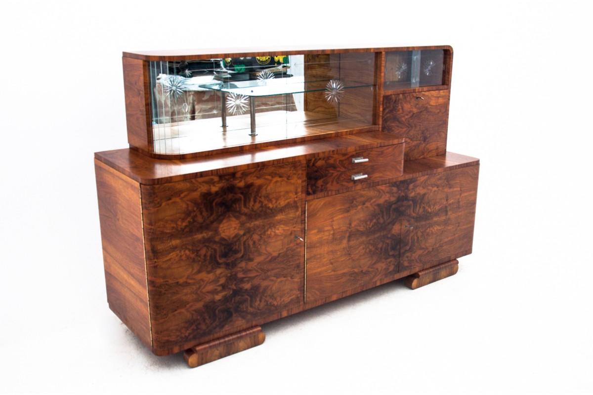 Buffet - Art Deco sideboard, Poland, 1930s

Very good condition, after professional renovation.

Wood: walnut

dimensions: height: 128 cm, width: 200 cm, depth: 58 cm.