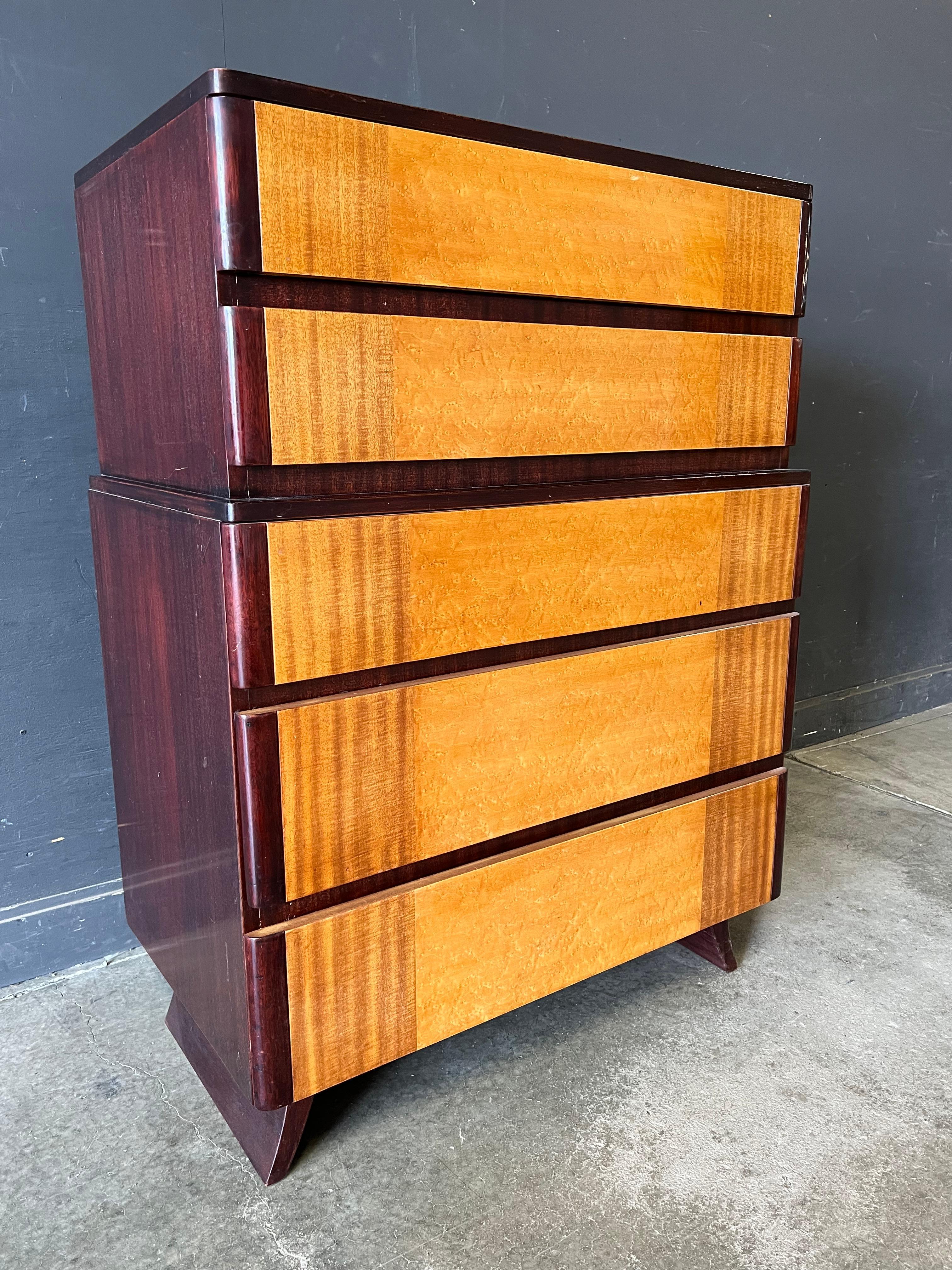 This is a wonderful Art Deco style chest of drawers either designed by Eliel Saarinen for R-Way or certainty in the style. This gentleman’s chest of drawers is available with our other listing for low dresser. All the pieces are in nice condition