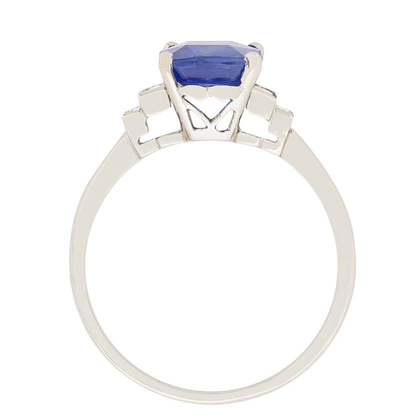 A beautiful art deco ring with a cushion cut sapphire set to centre. The natural unheated gemstone weighs 2.00 carat and has been perfectly set within the four claw collet. The sapphire is Sri Lankan in origin and the ring dates back to the 1940s.