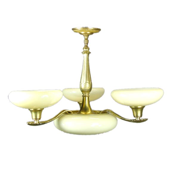 Brass  three arms chandelier with opaline  glass 
Center glass has one bulb
Four internal light.