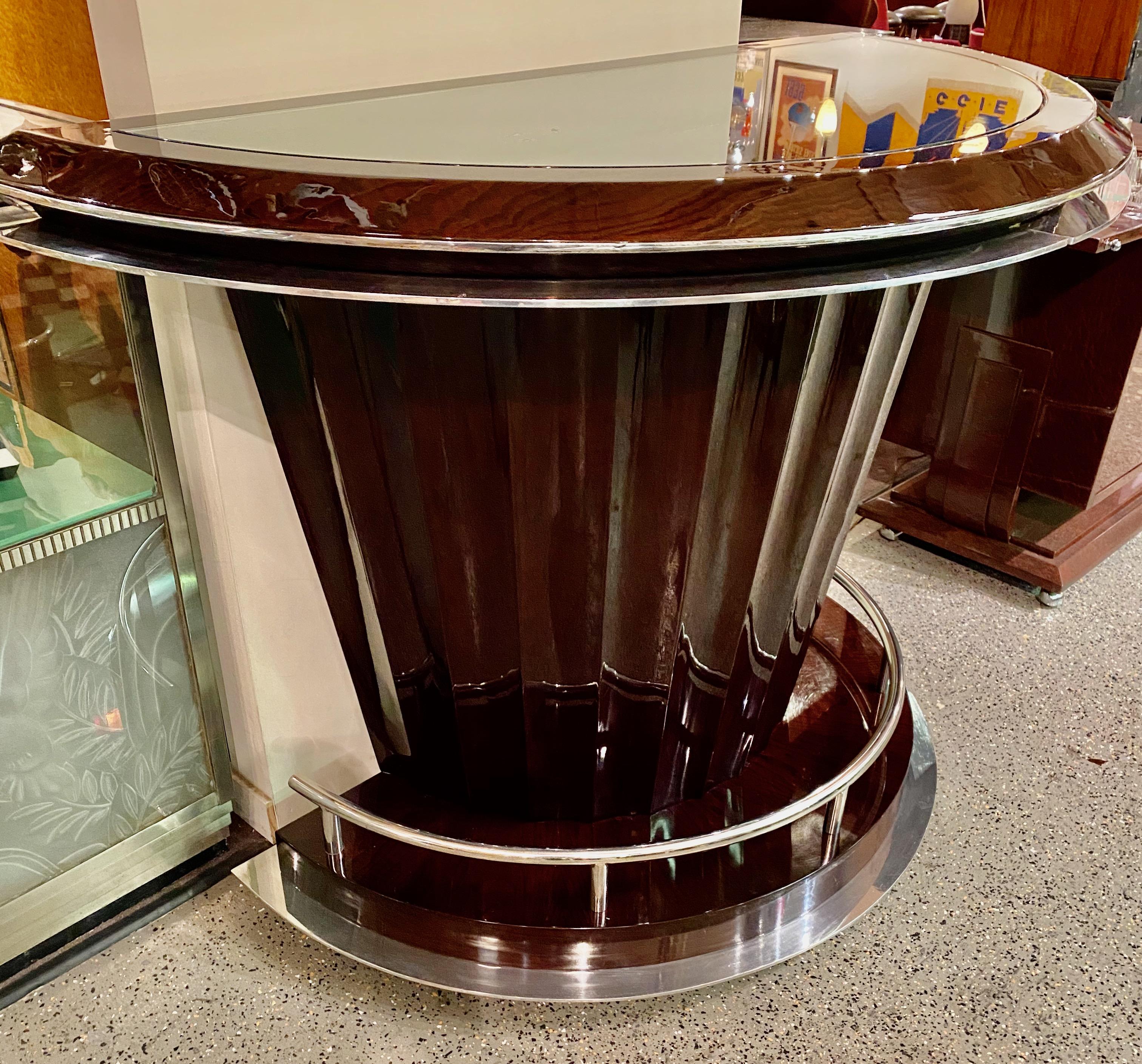Art Deco custom fluted stand behind bar with chrome. Dark walnut wood, hand-finished with a stunning European patina. This newly made custom design would be great for your home bar, man cave or annex for your dining room experience.

Many nice