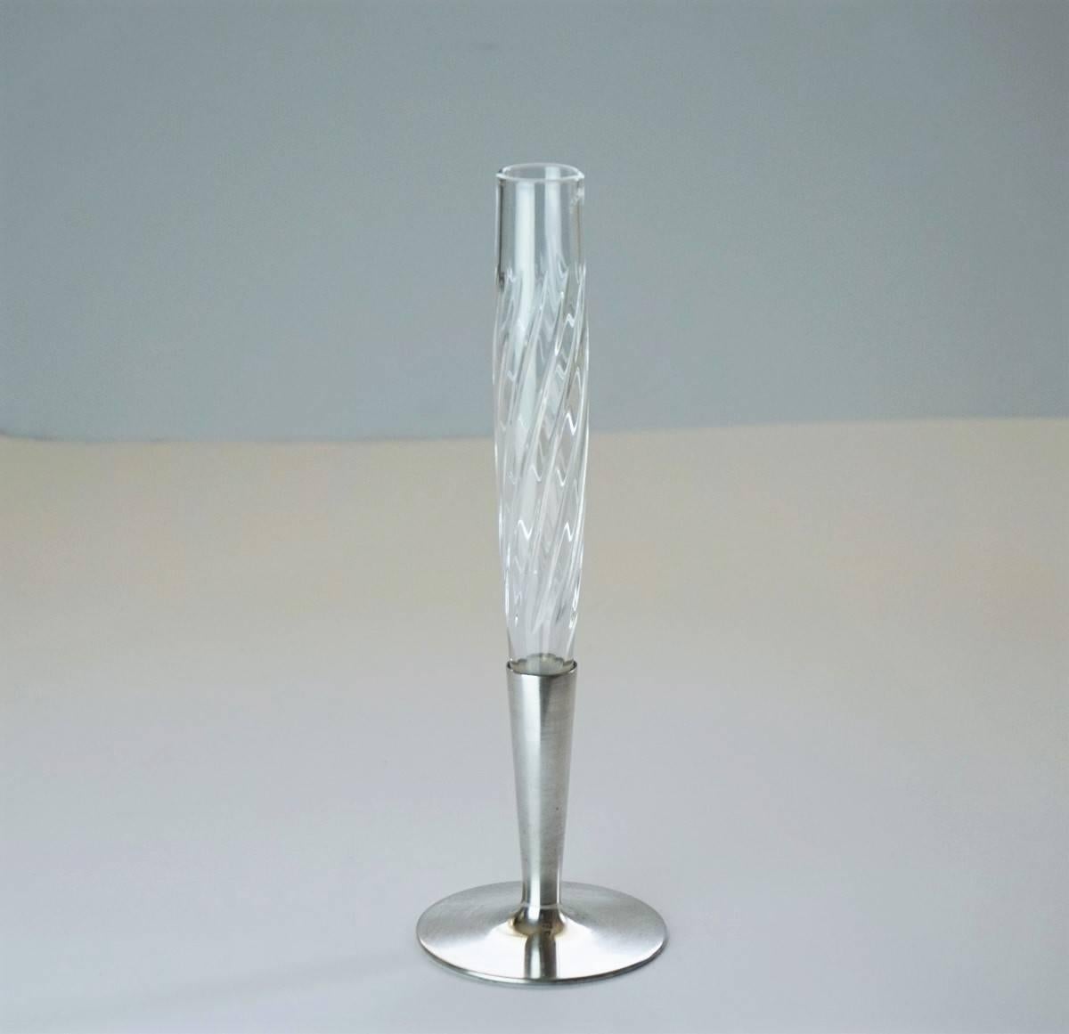 A Lovely Art Deco silver solitary of beautifully handcut crystal and sterling silver by Topázio, Portugal, circa 1930-1935.
Hallmarked: Topázio poincon.
Measures: Height 8.75 in (22 cm)
Diameter/base 2.50 in (7 cm).
 
 