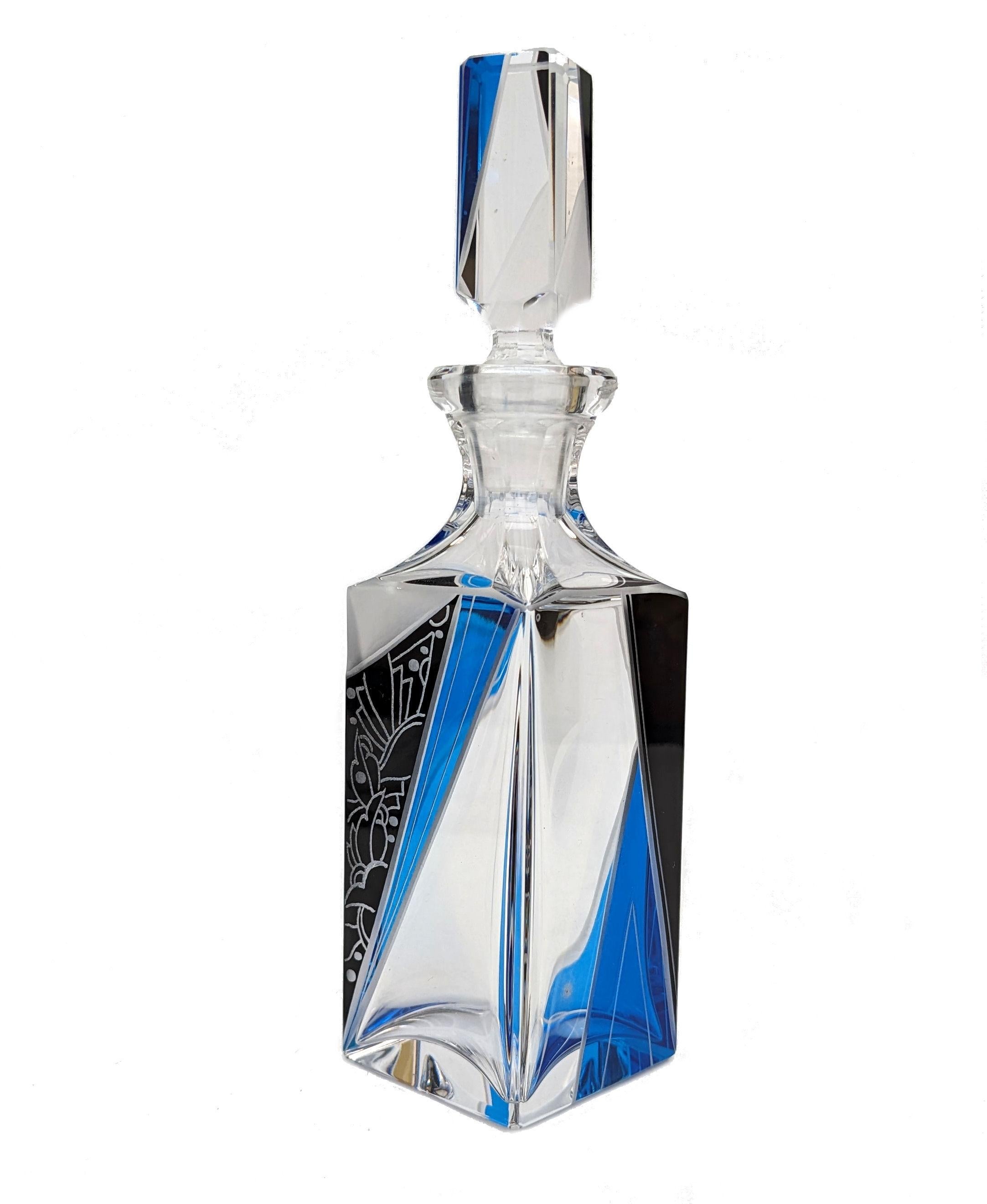 Art Deco large cut glass perfume scent bottle, dating to the 1930's and originating from France. In clear cut glass with vivid blue enamelled geometric design. Glass cut glass stopper. Manufactured in Czech republic in the 1930s this stunning bottle