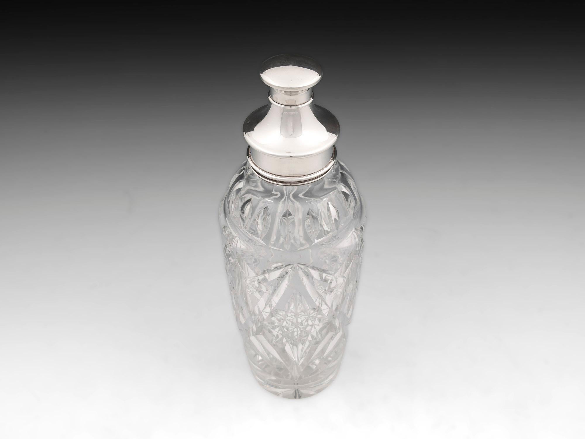 Art Deco cut glass and sterling silver cocktail shaker with removable strainer. Silver marks rubbed.