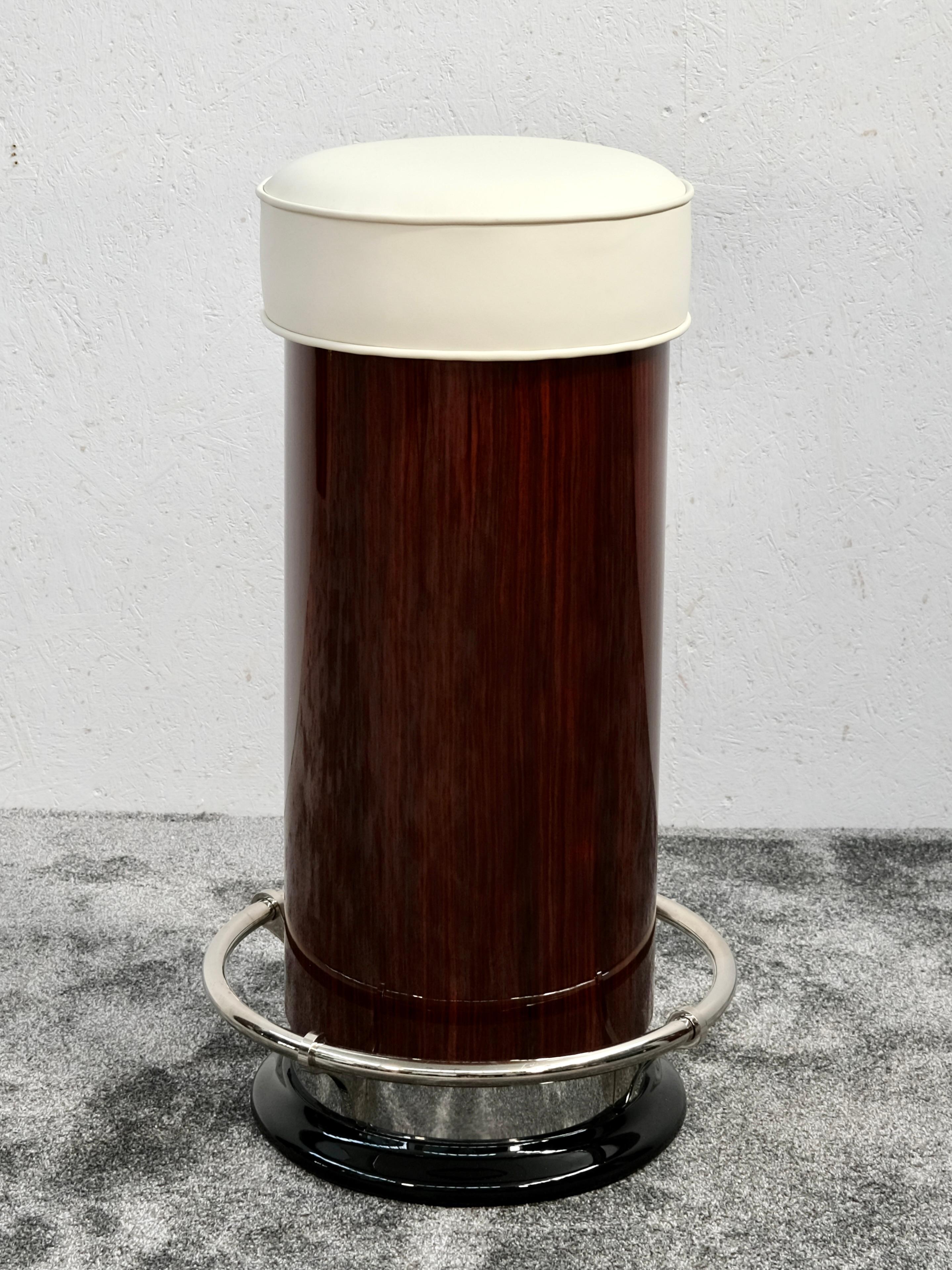 Immerse yourself in the charm and sophistication of authentic French Art Deco design with this beautifully restored barstool from the 1940s. Each of the four available stools embodies the elegance and timeless craftsmanship of an era when furniture