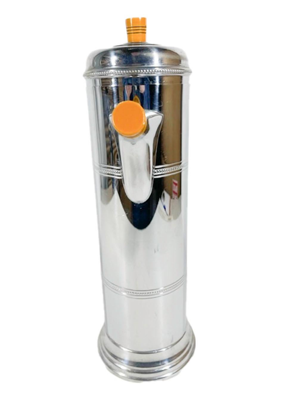 Art Deco chrome cocktail shaker of cylindrical form with beaded bands made by the Krome-Kraft division of Farber Brothers. Having a butterscotch handle as well as lid and spout knobs each embellished with blackened incised lines. Marked on the