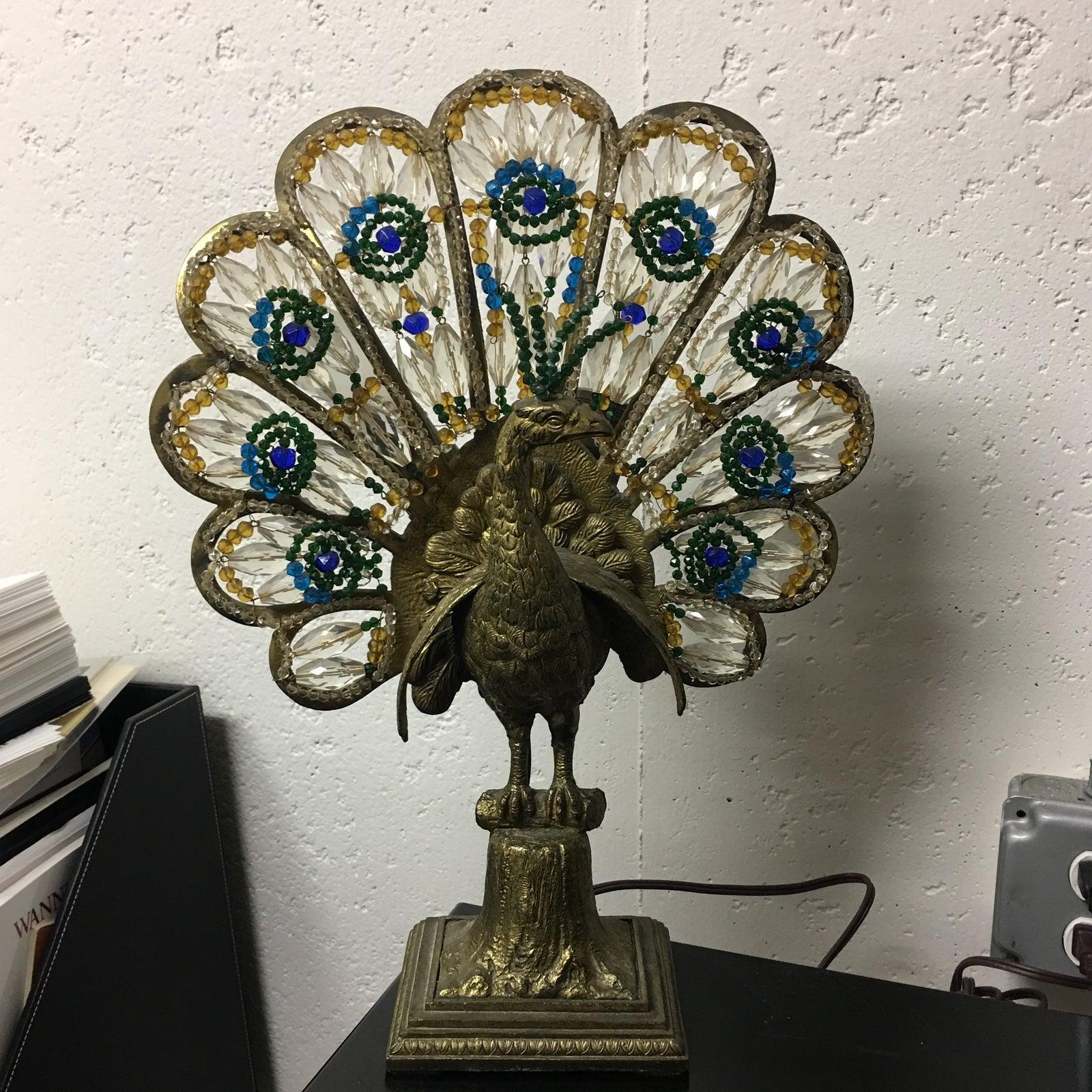 An elaborately made Art Deco Bronze & Bohemian Crystal Peacock Nightstand Lamp, Ca. 1920's. Two Edison bulbs and wired for use