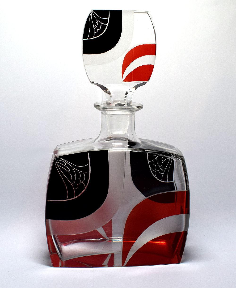 Very high quality, collectible 1930s Art Deco Czech decanter set by Karl Palda. Features the classic Karl Palda black and red geometric enamel decorations to each piece. These classic sets are rare and a beautiful addition to any deco collection. No