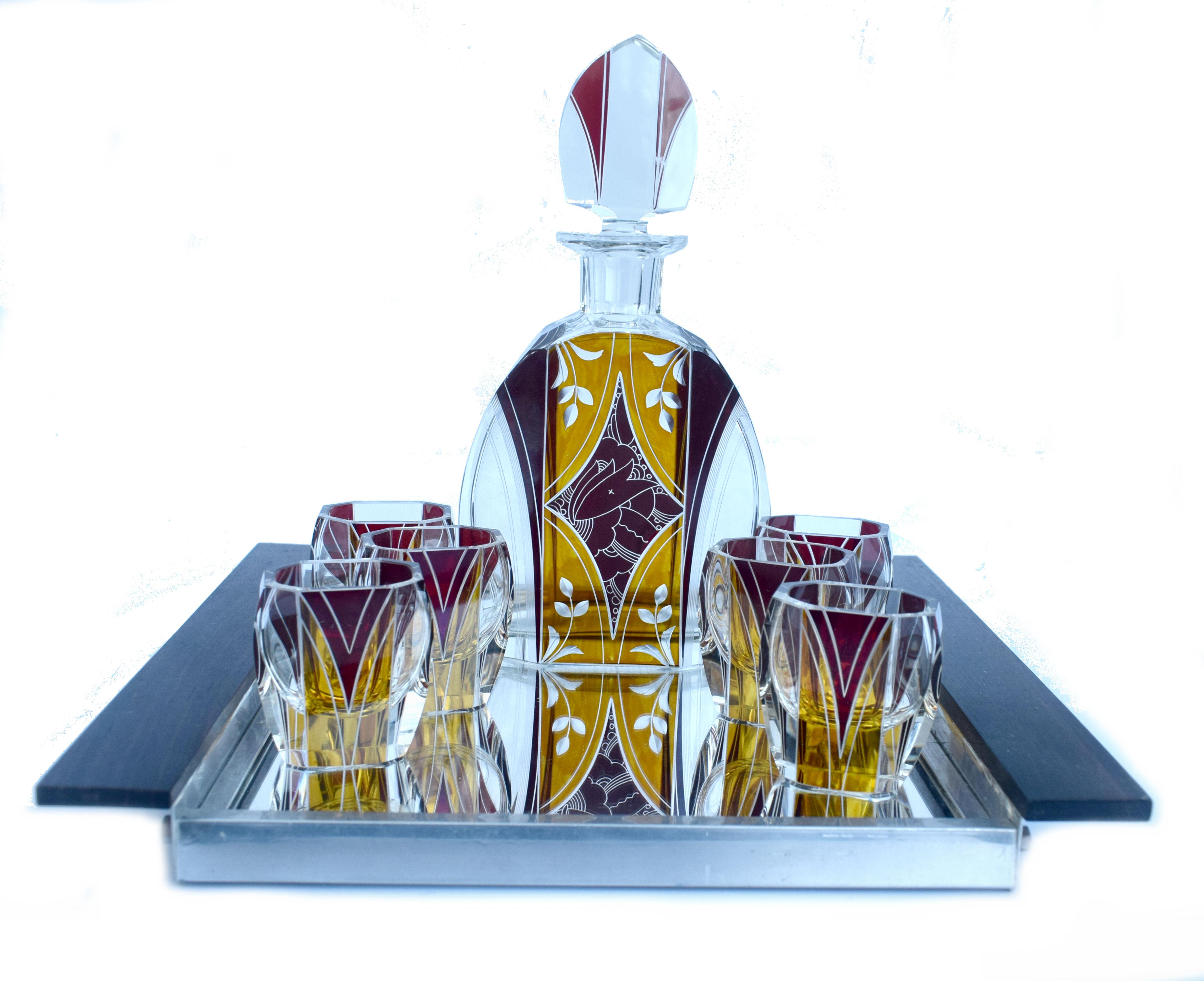 Very high quality, collectible 1930s Art Deco Czech decanter set by Karl Palda. Features large crystal decanter with six shot glasses, hand blown crystal with diamond polished edges. The set is both enamelled and engraved with beautiful detailing