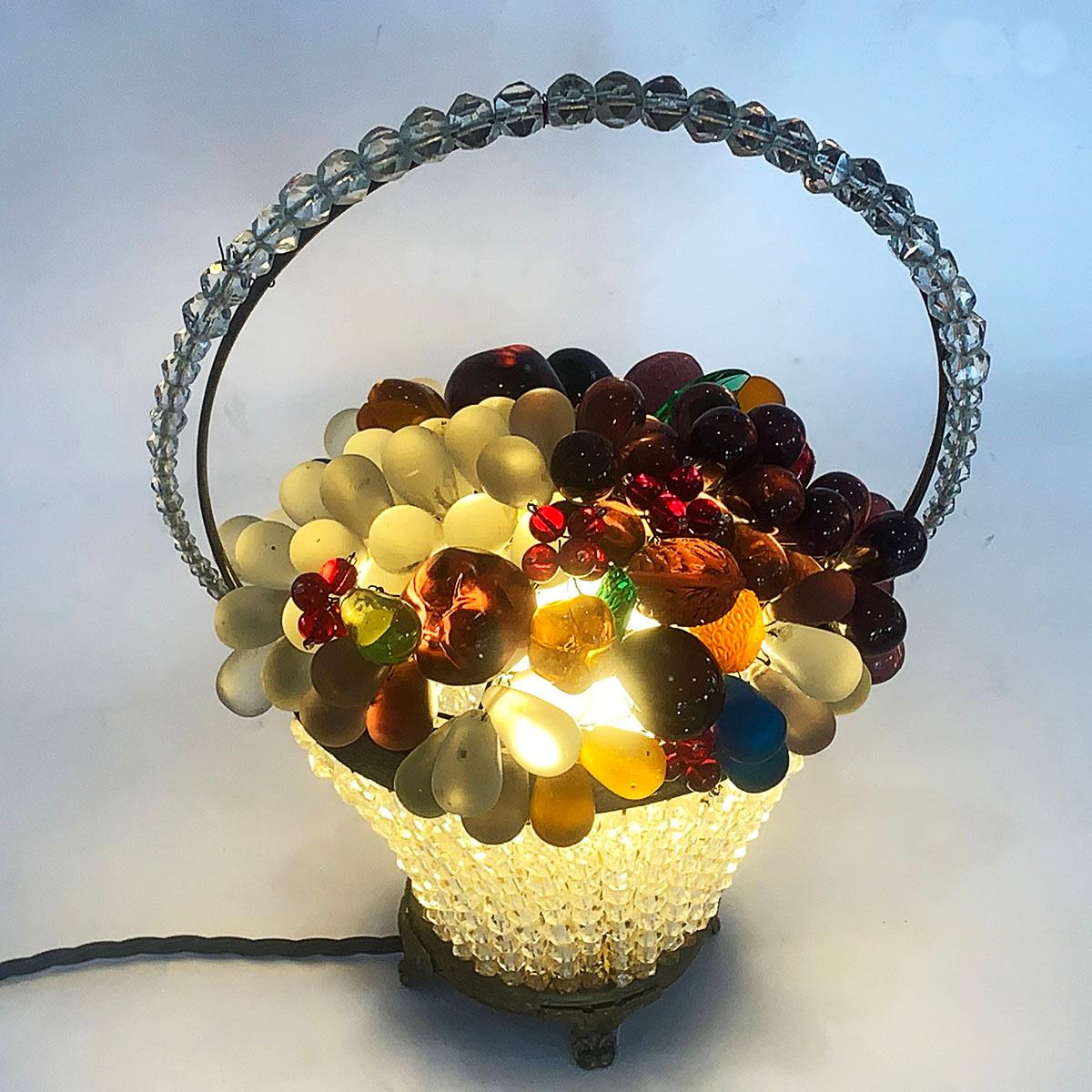 Superb Art Deco fruit basket glass lamp, “Made in Czechoslovakia”, as impressed underneath to the metal. Multiple different glass fruits and leaves in vibrant colors and realistic shapes, the bronze tone metalwork is intricately decorated with