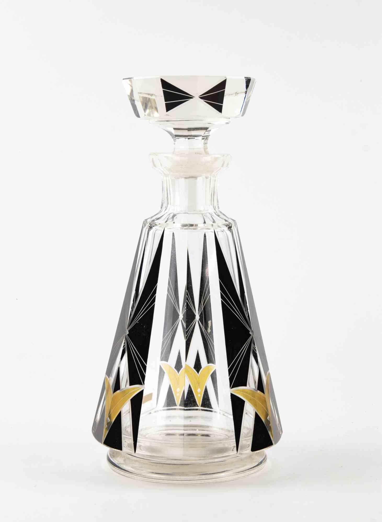 Beautiful vintage Art Deco carafe realized in 1930s, attributed to Karel Palda.

In excellent condition, it includes its original cap.

