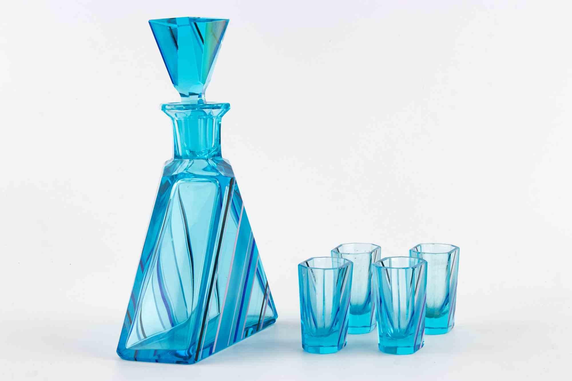 Hervorragendes Art Deco Glas Likör Set Attr. zu Karel Palda.

Es enthält eine Flasche und 4 Gläser.

Abmessungen der Gläser cm. 6.5x4.5x3.5

Erstklassiger Zustand.