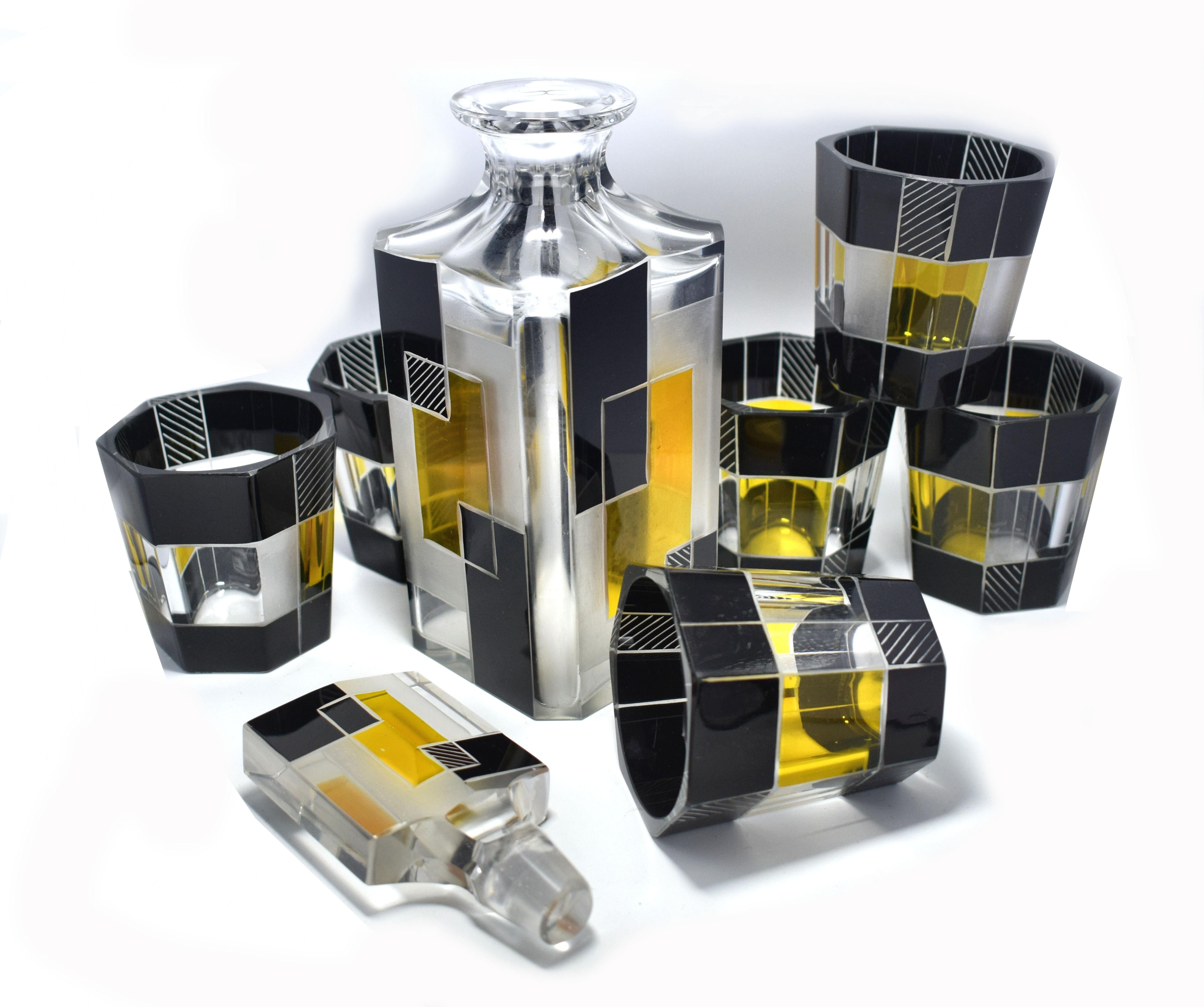 Very high quality, very striking looking 1930s Art Deco Czech glass decanter set. Features a Classic shape decanter with stopped and six decent sized glass tumblers . The whole set is enameled in yellow and black with etching to highlight the