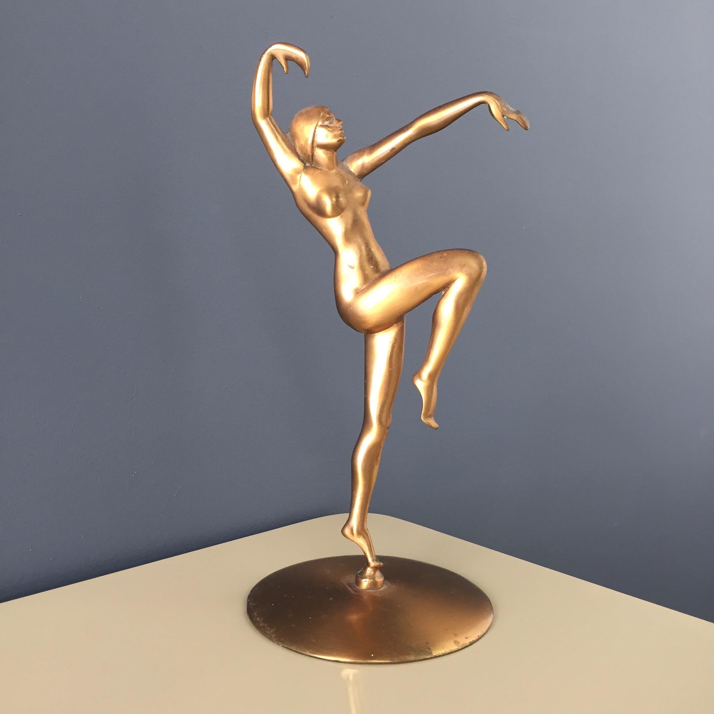 This listing is for a Classic and striking Art Deco copper sculpture depicting a dancing nude by Henri Lautier who was a French Sculpture. The sculpture stands at approx 12.25 inches tall, 6