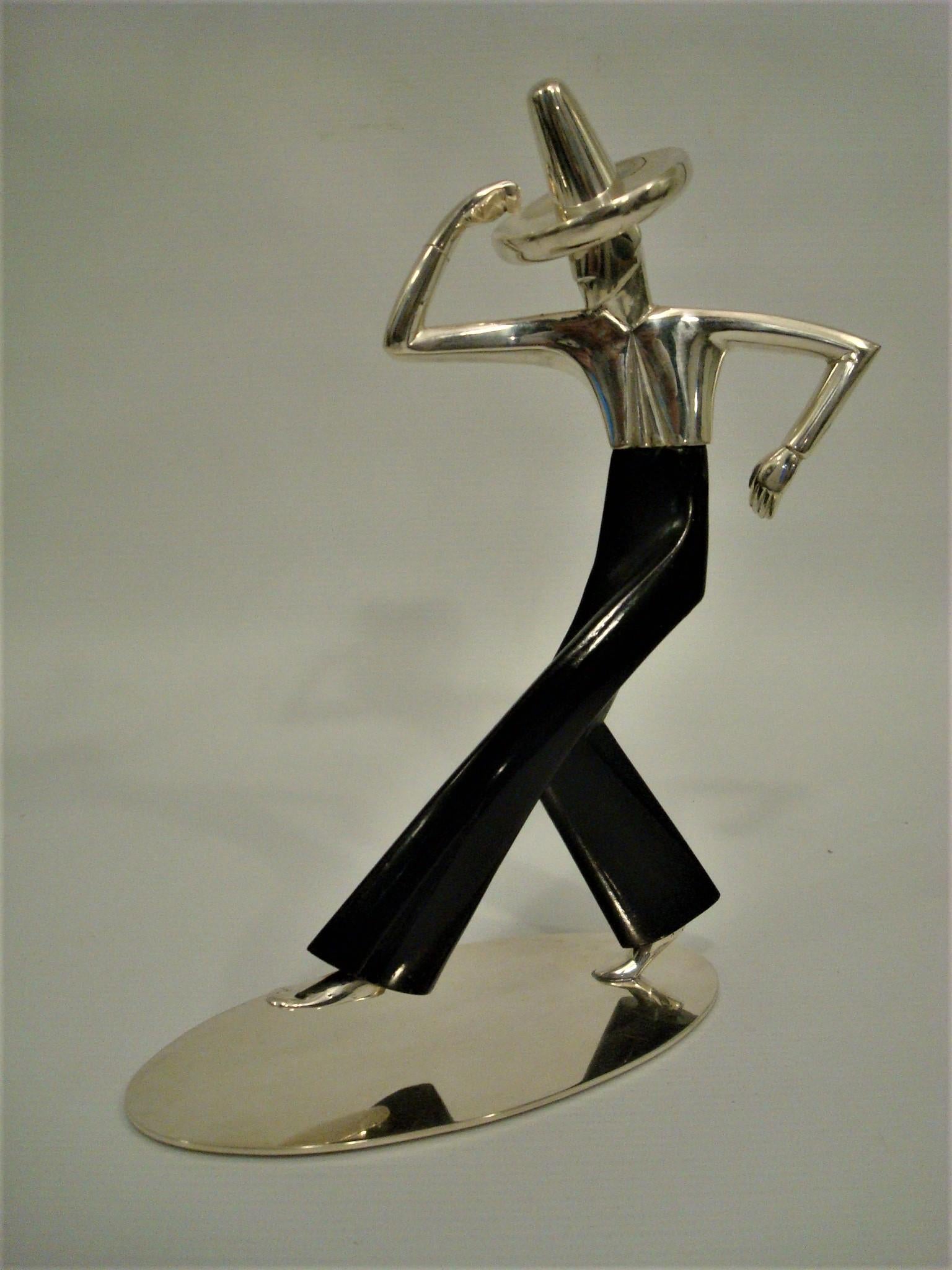 Art Deco Dancer Werkstatte Hagenauer Vienna Brass Polished Wood, Designed 1930s

In the beginning the Werkstatte Hagenauer produced everyday life items like lamps, ashtrays, boxes but also reliefs and bronze figurines. As Karl Hagenauer took over