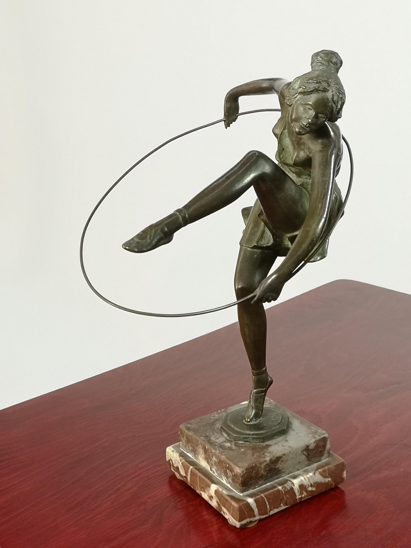 Art Deco Dancer with Hoop by Bruno Zach, The bronze on marble sculpture. is signed, ZACH on the bronze base, it is probably from the 1925-30's period.