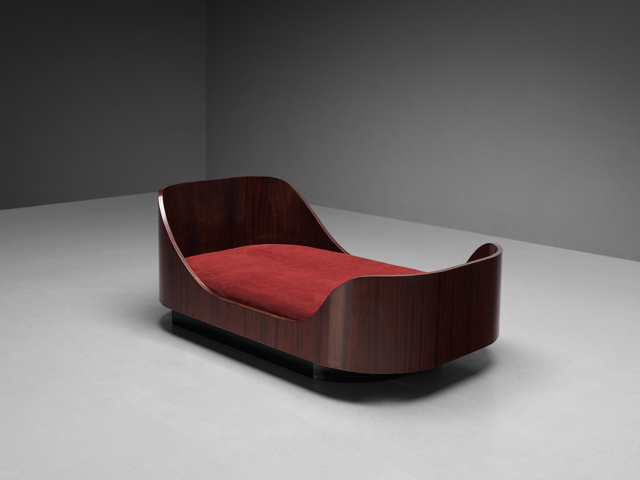 Bed / daybed, mahogany, pine, Denmark, circa. 1940 

This eloquent bed alludes to the stylistics traits of the artistic Art Deco movement of the 1940s. The design is based on a boat shaped construction featuring a high headboard and footboard as