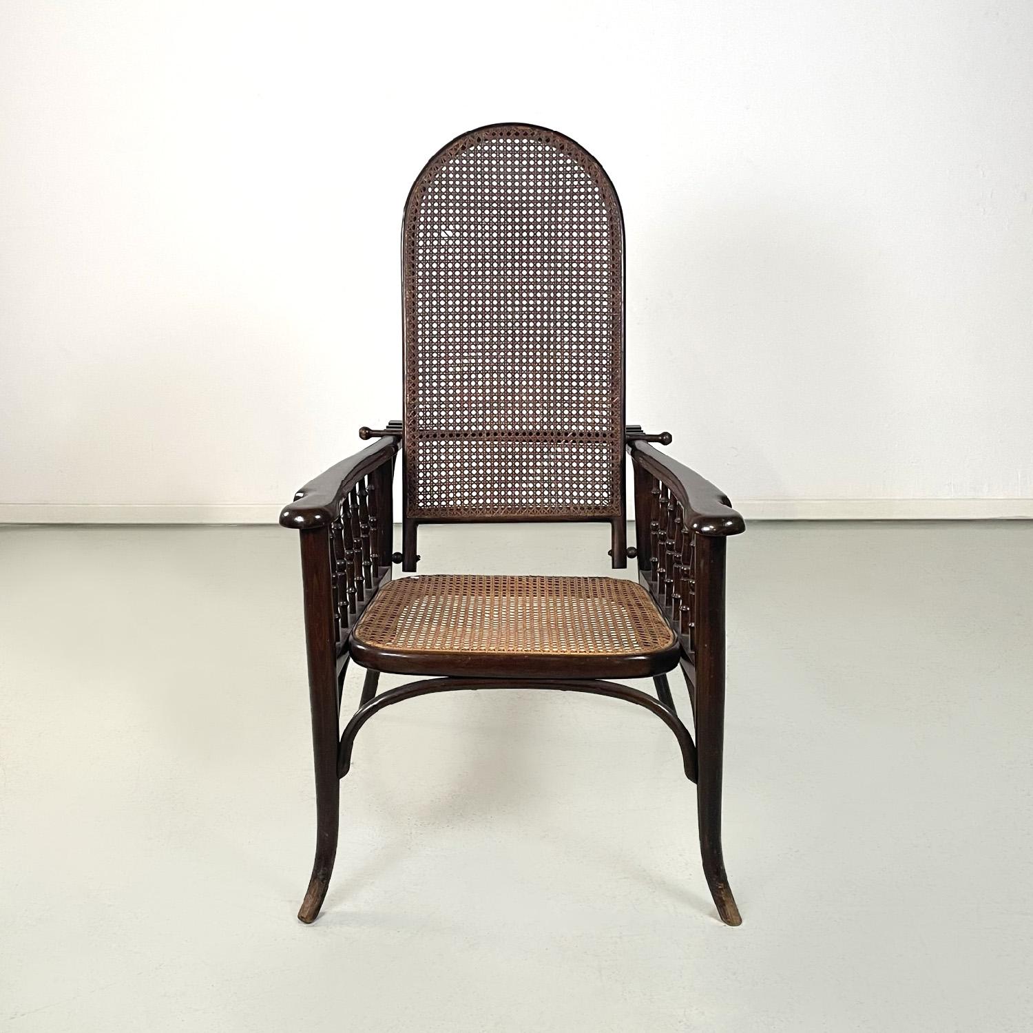 Italian Art deco dark wood and straw armchair with reclining backrest, early 1900s For Sale