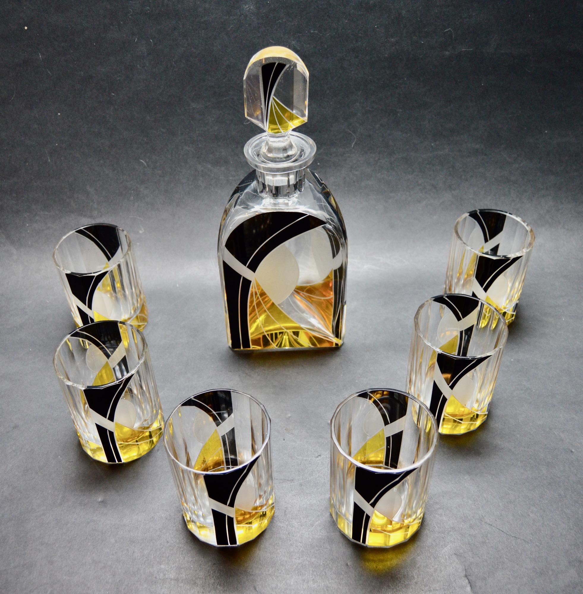 This decanter and glasses by Karl Palda is one of the nicest we have ever offered. All of the designs by this forward-thinking artist from the deco era in Czechoslovakia are quite wonderful but what sets this apart is the size of the glasses which