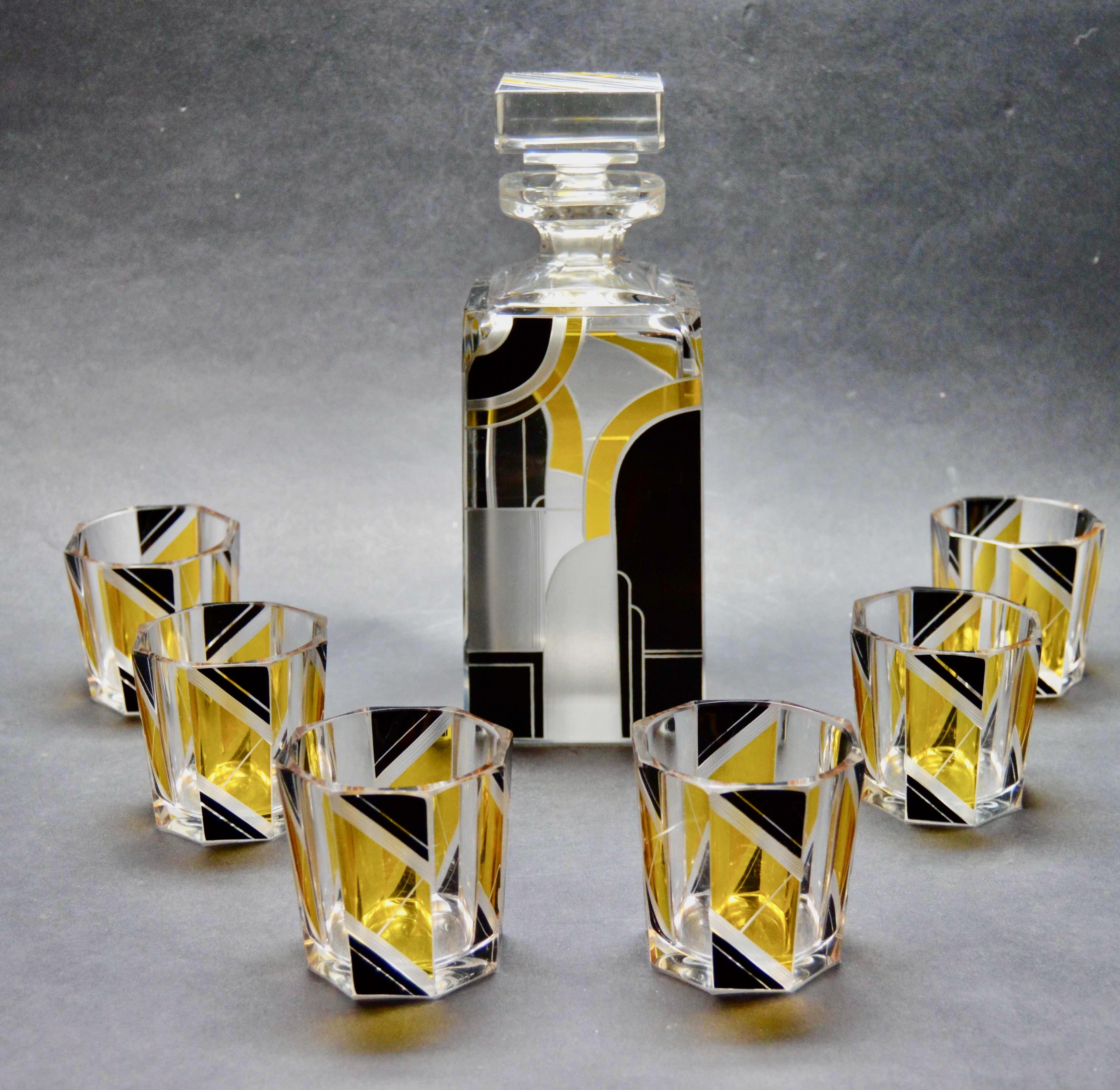 Karl Palda’s decanter and glasses are some of the finest pieces we’ve ever offered. While all of his designs from the Art Deco era in Czechoslovakia are remarkable, this set is particularly noteworthy for the size of the glasses. Unlike the typical