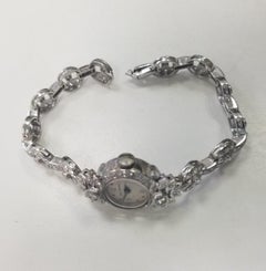 Late Art Deco Delbana Platinum Diamond Watch-Bracelet Diamond Weight 3.05 Carats