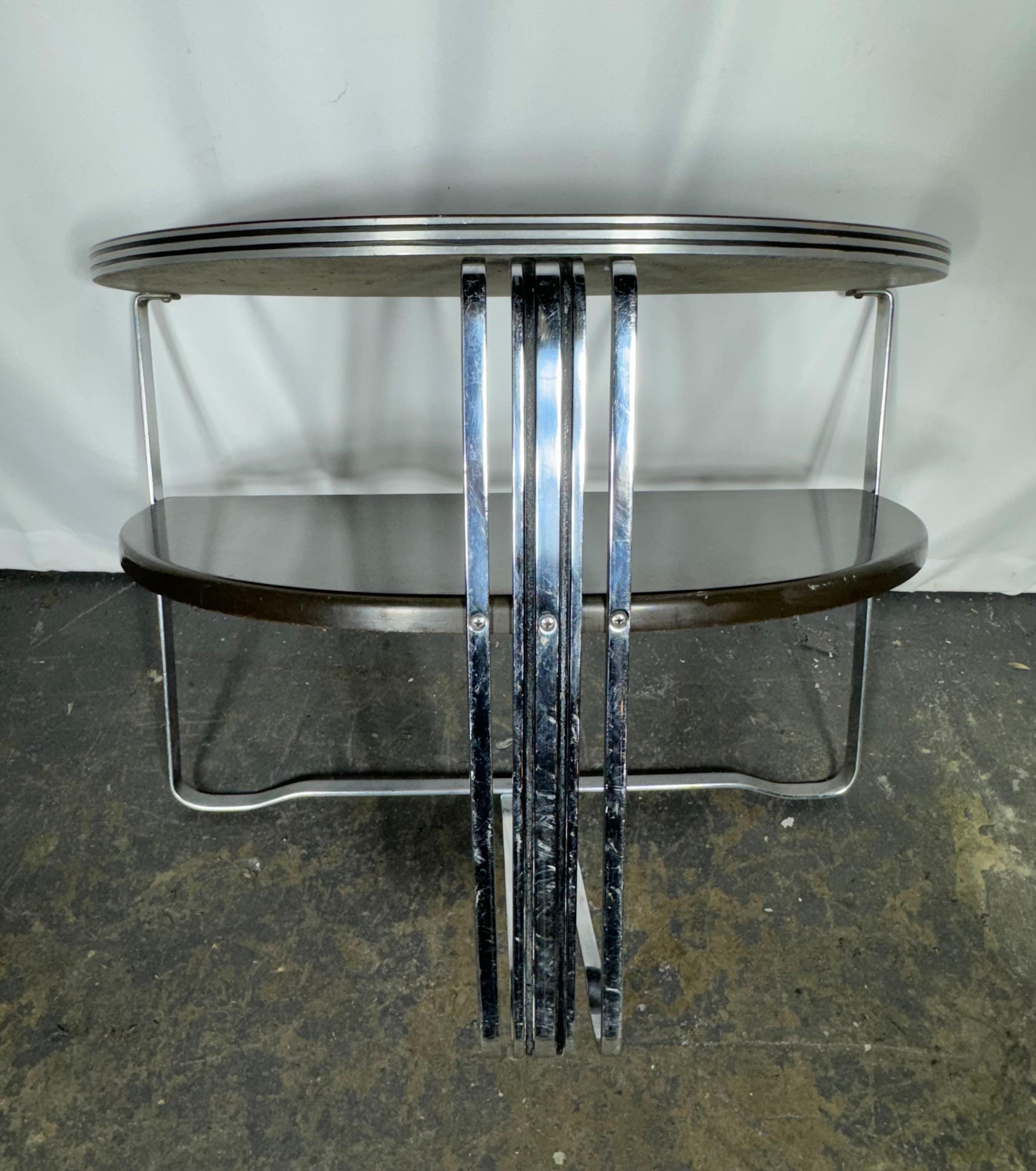 Stunning Art deco demilune table designed by Salvatore Bevelacqua for the Mckay Craft Company in the 1930’s Amazing condition.. Top may have been replaced (long ago) Rare example of Deco/ Modernist design 