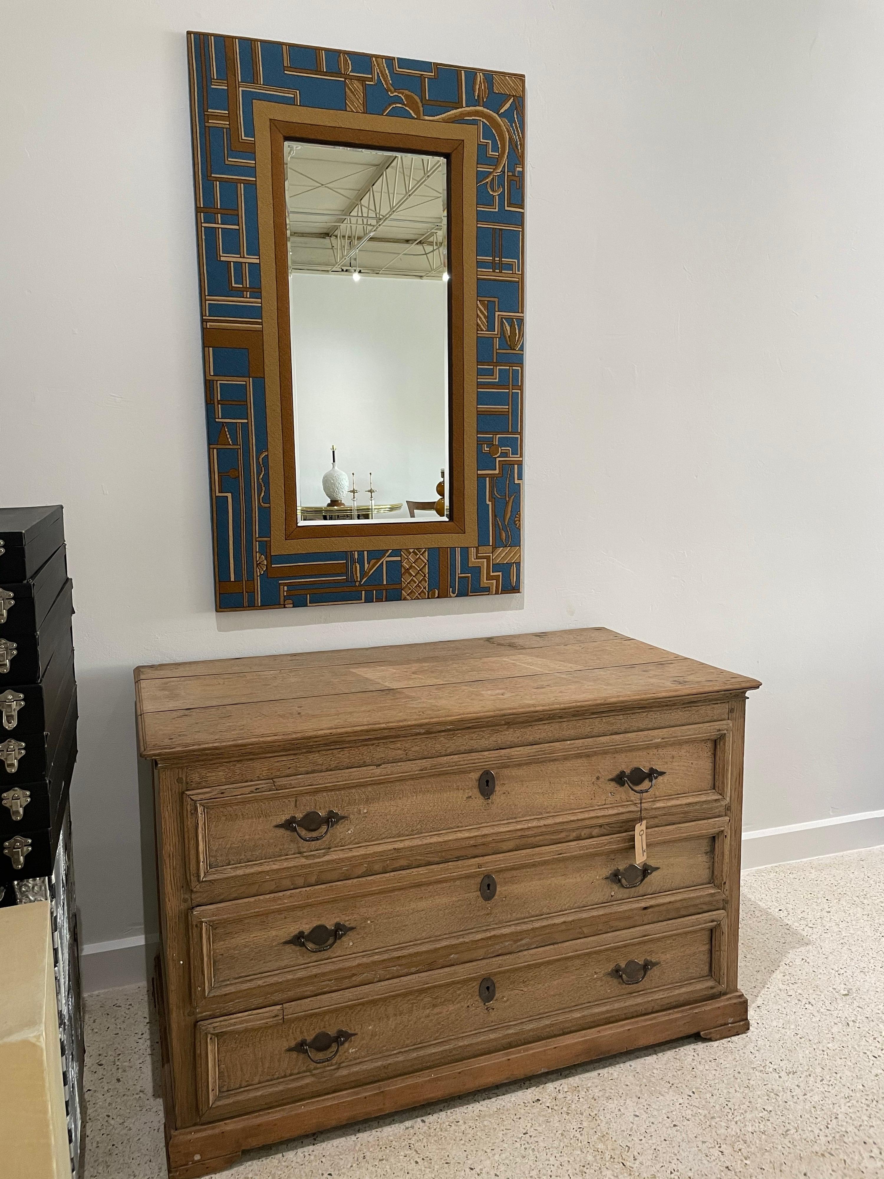 This is all original - hand made needlepoint in fine tight design. From the Art Deco design, the caramel, beige and blue tones are vivid and very clean. Bevelled mirror insert is perfect.