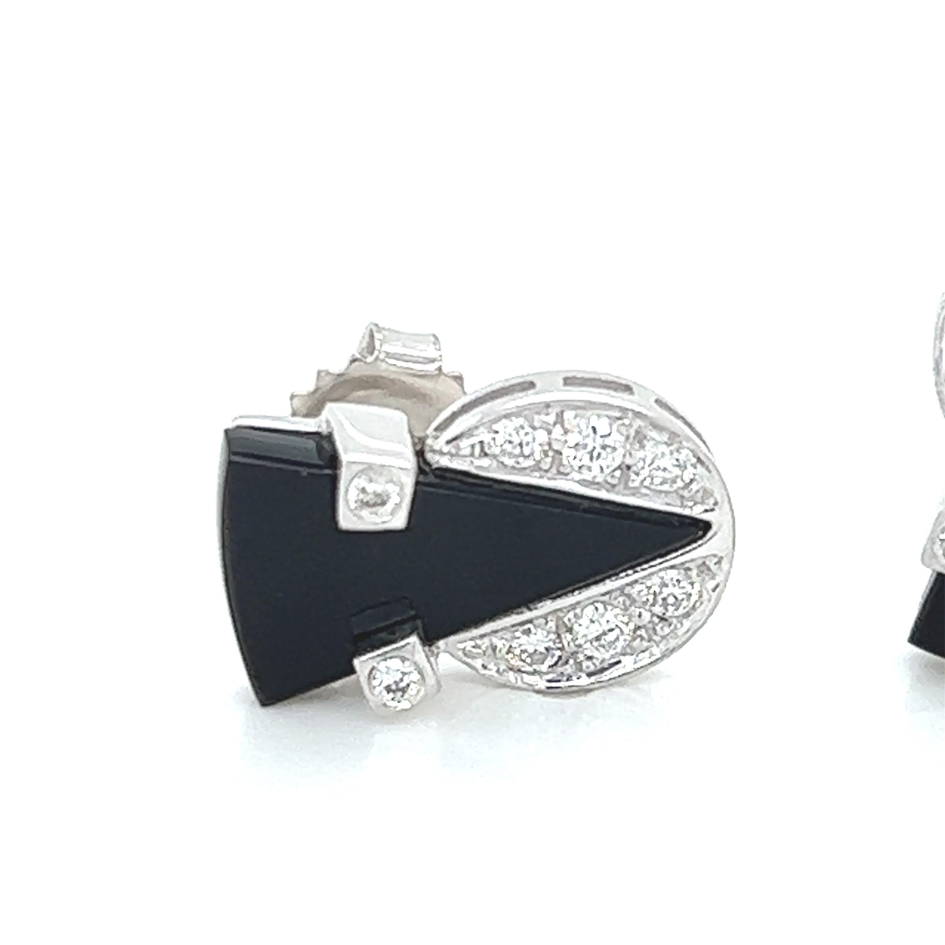 Art Deco Design Diamond and Black Onyx Stud Earrings in 18k White Gold.
Comes with 18k gold earring backs. 

It measures approx. 13.90mm x 9mm
