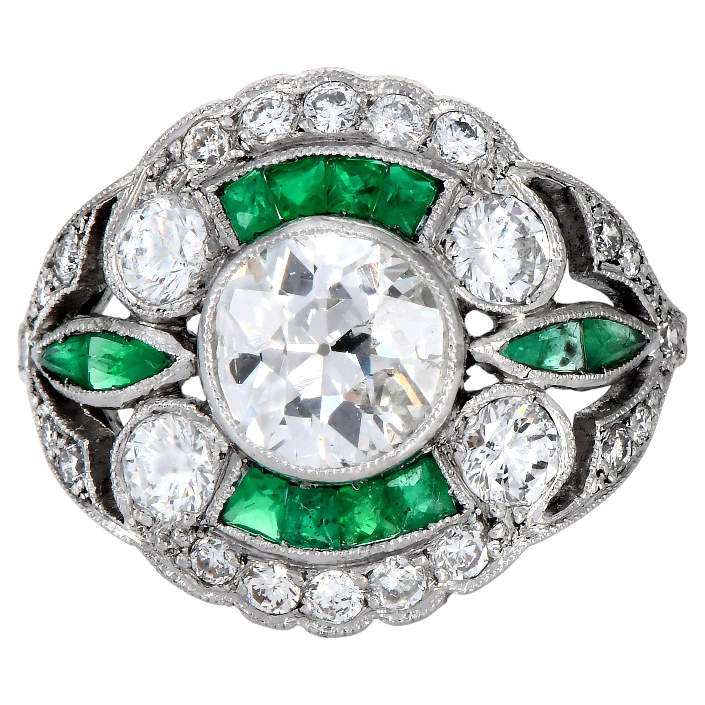 Anello in platino con diamanti Old Mine e smeraldo di design Art Deco