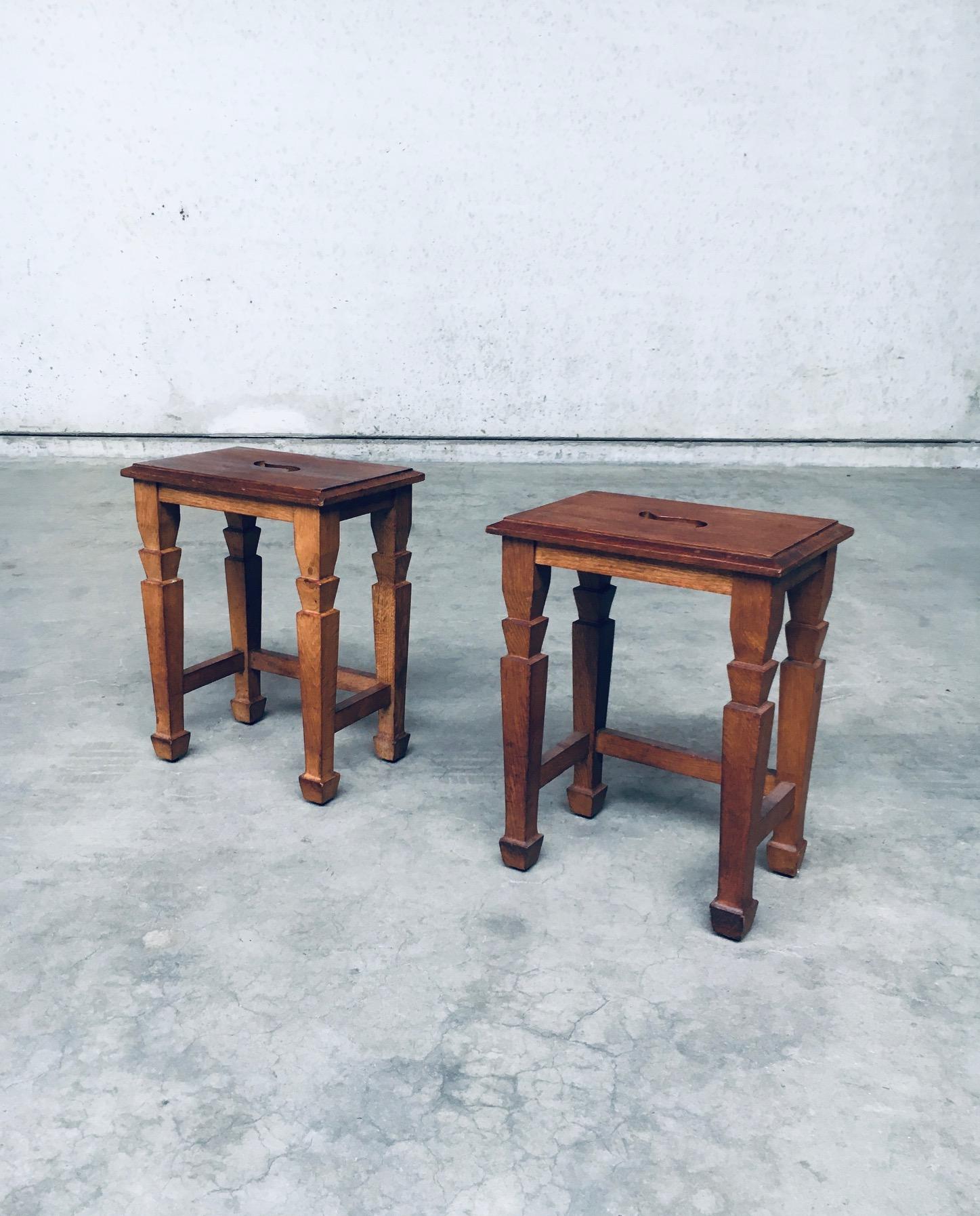 Vintage Art Deco Arts & Crafts Design S Handle Stool set of 2. Made in the Netherlands, 1930's period. Solid oak constructed stools which can also be used as side tables. Nice design with an S shaped handle in the seat top. Has features of the