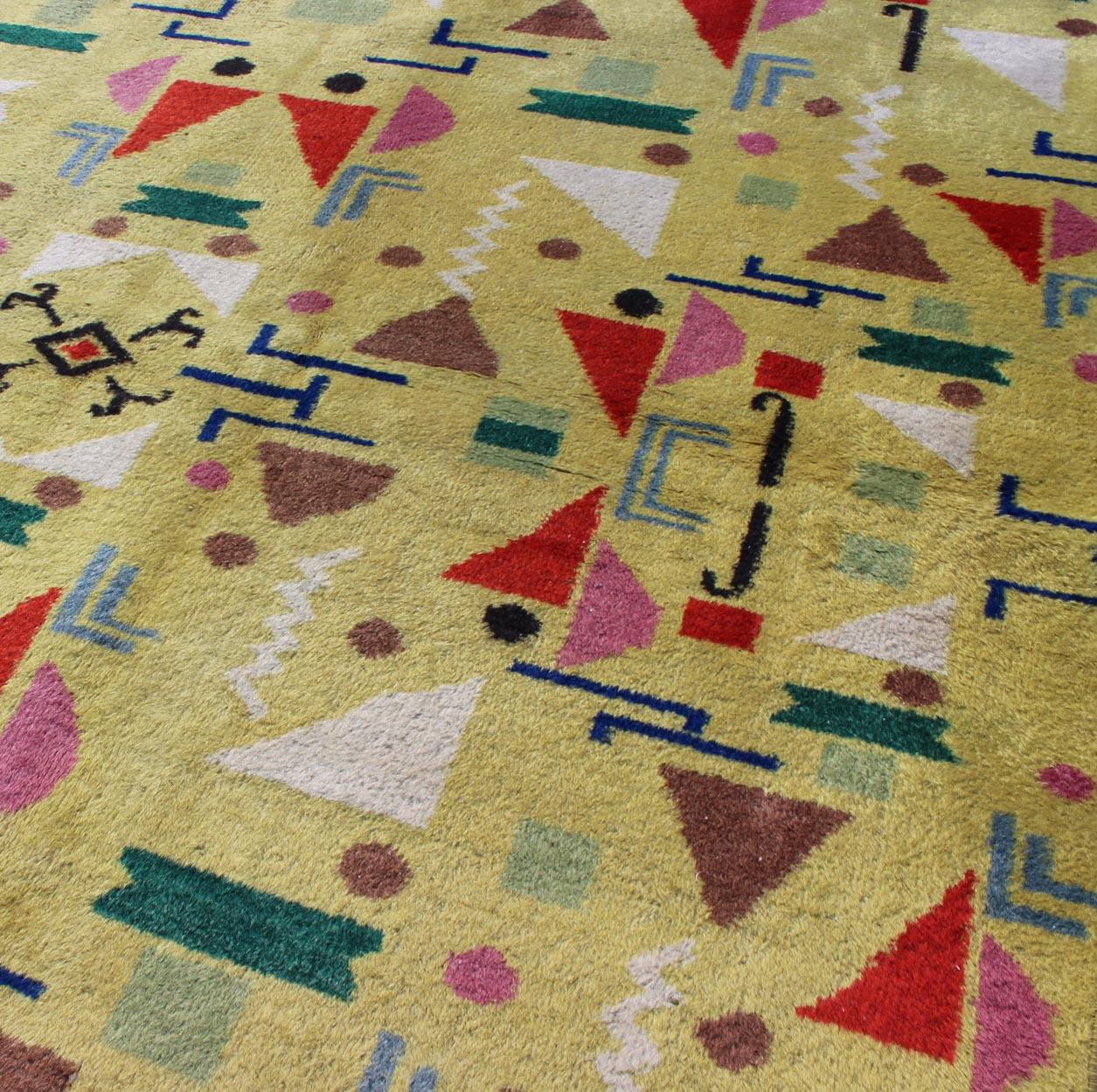 Wool Mid-Century Modern Vintage Turkish Rug in Yellow Background and Multi-Colors For Sale
