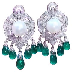 Art Decô Design with 37.47 Carats Emeralds, Diamonds and Pearls on Earrings