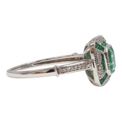 Art-Deco Designed Colombian Emeralds and Diamonds in Platinum cocktail ring