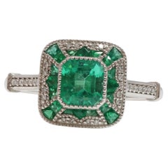 Art-Deco Designed Colombian Emeralds and Diamonds in Platinum cocktail ring