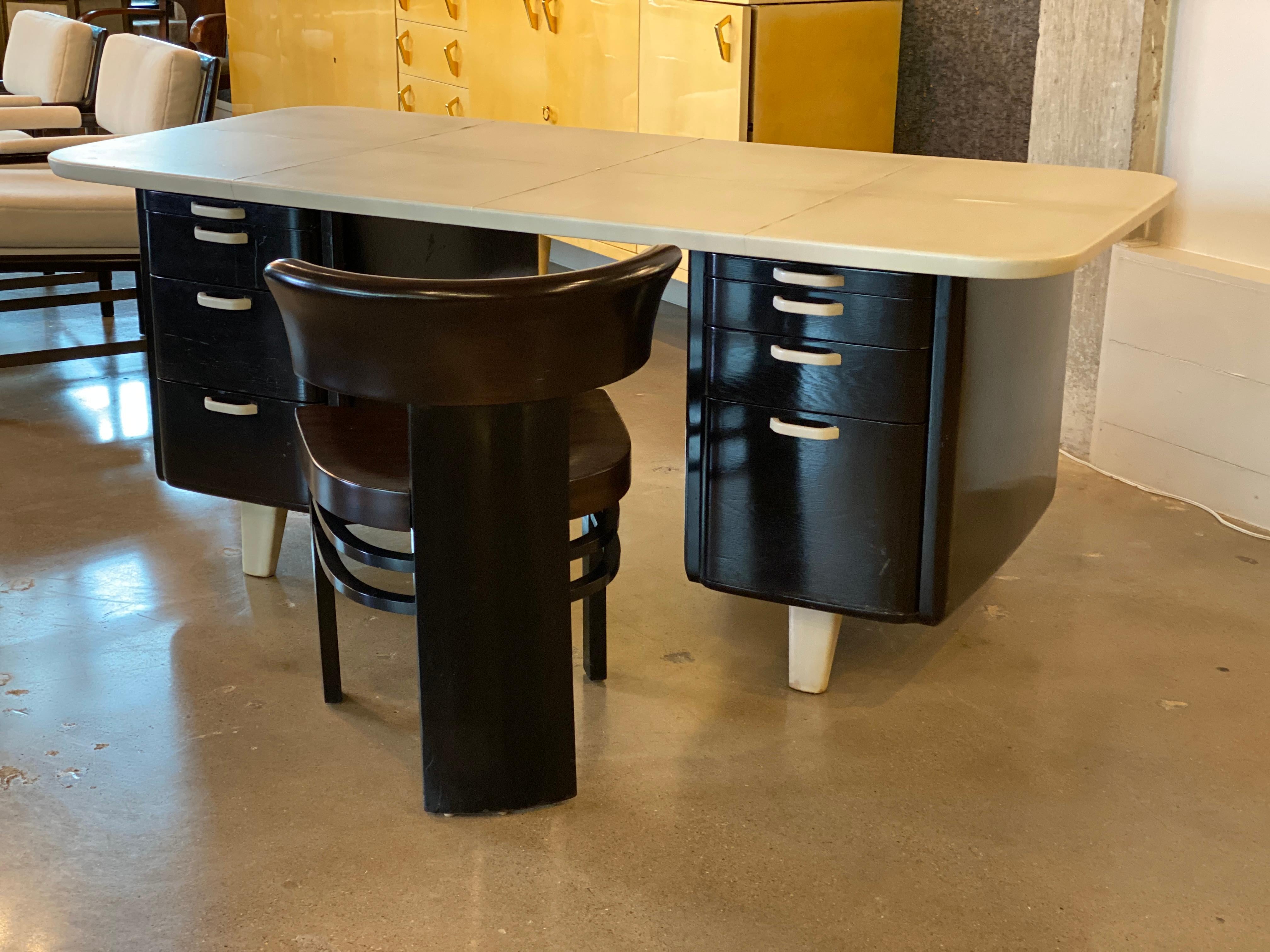 Double pedestal desk with goatskin parchment top and trim and matching desk. Designed by Vittorio Valabrega, a hard to find Art Deco designer, Italy, 1930's. Measures: Chair: 31